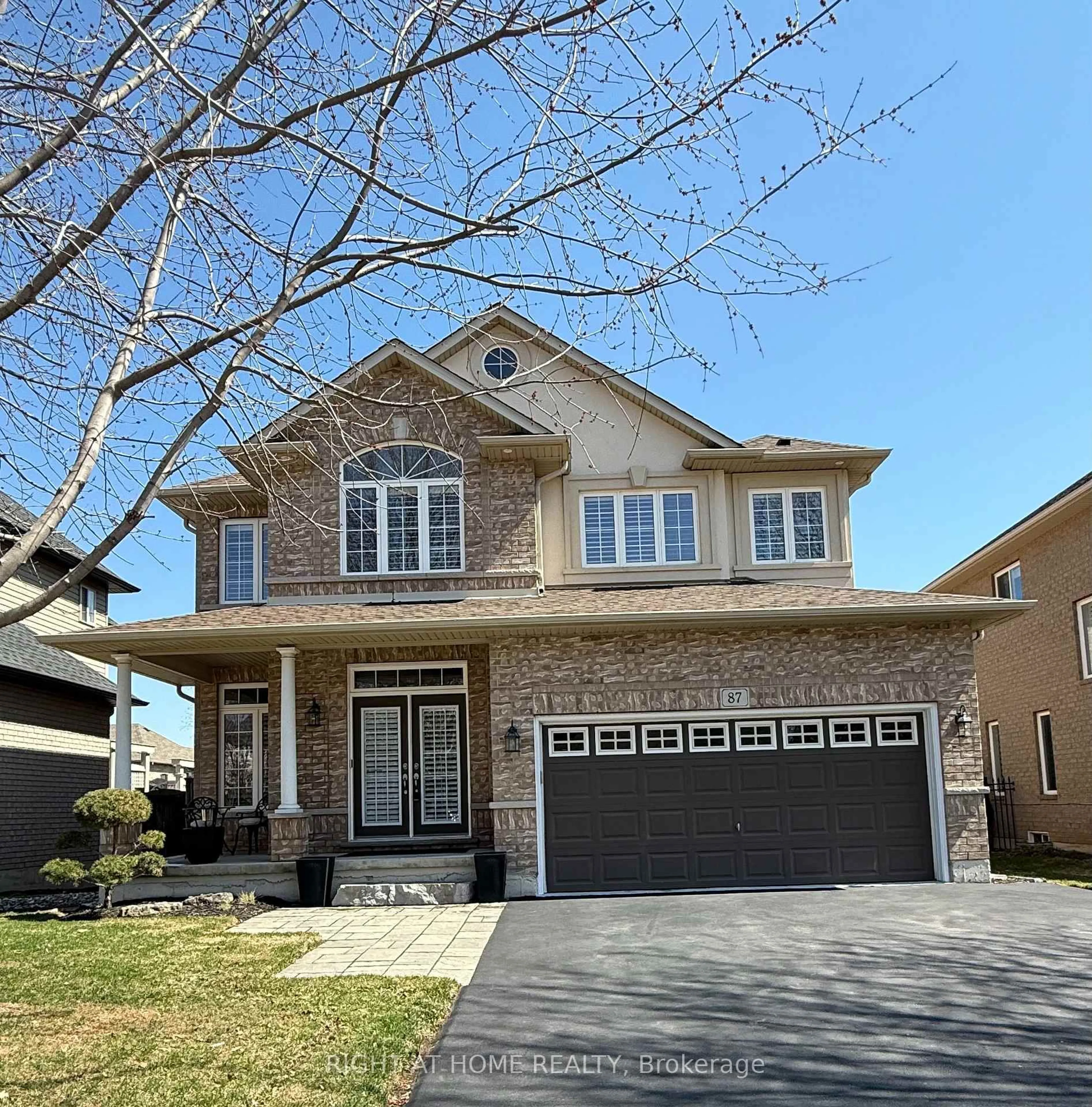 Home with vinyl exterior material, street for 87 Newcombe Rd, Hamilton Ontario L9H 0A6