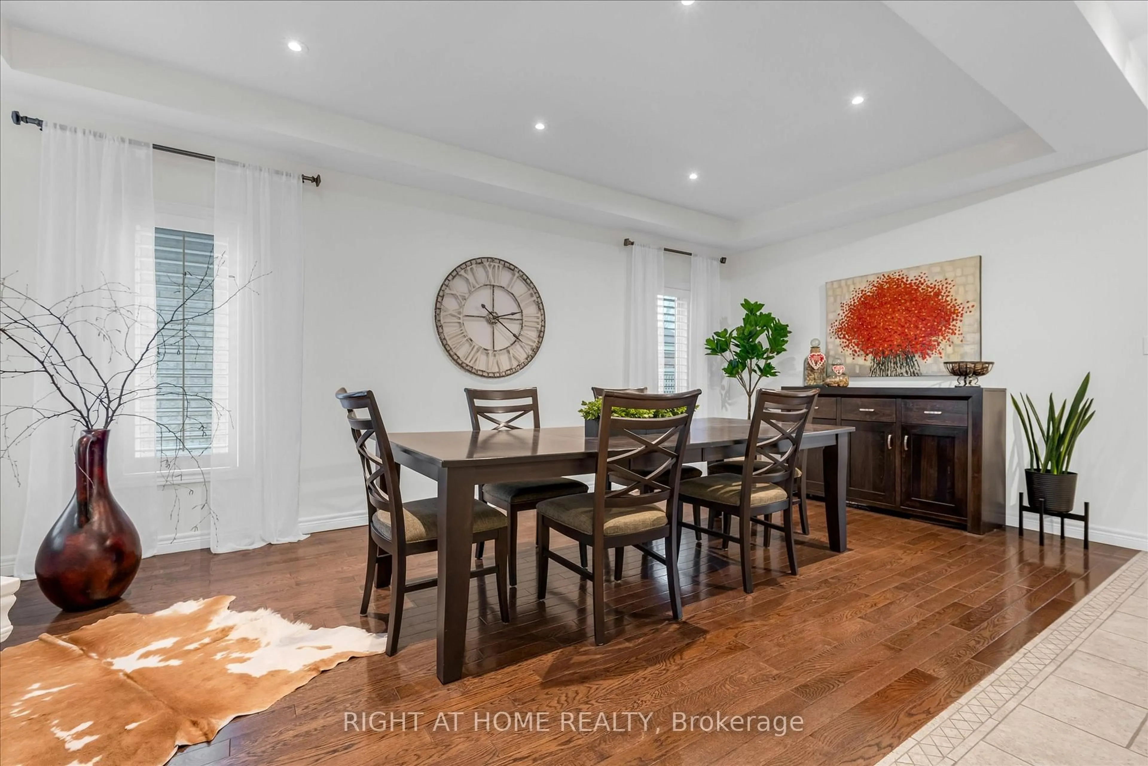 Dining room, wood/laminate floor for 87 Newcombe Rd, Hamilton Ontario L9H 0A6