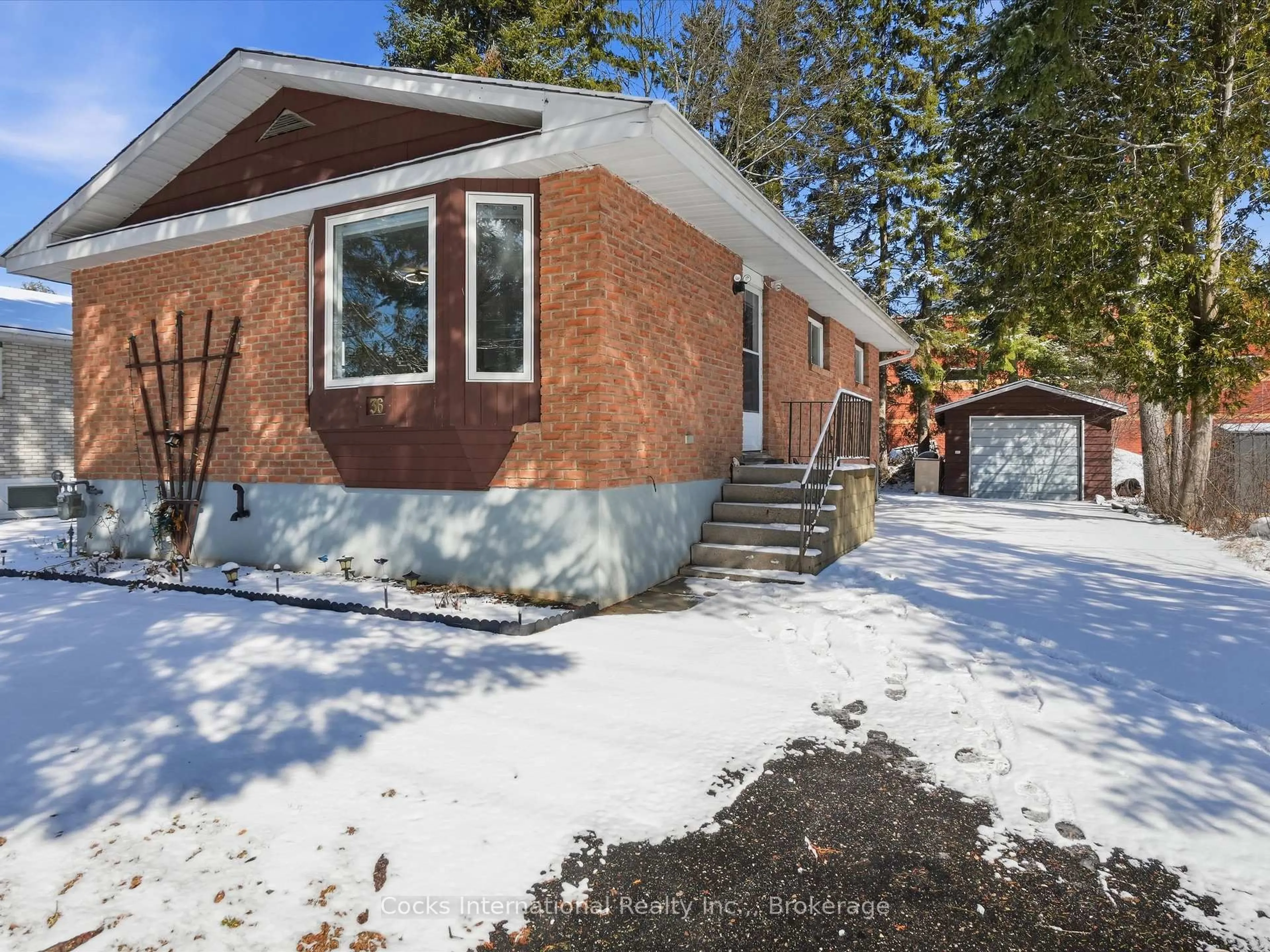 Home with brick exterior material, street for 36 Susan St, Huntsville Ontario P1H 1X2
