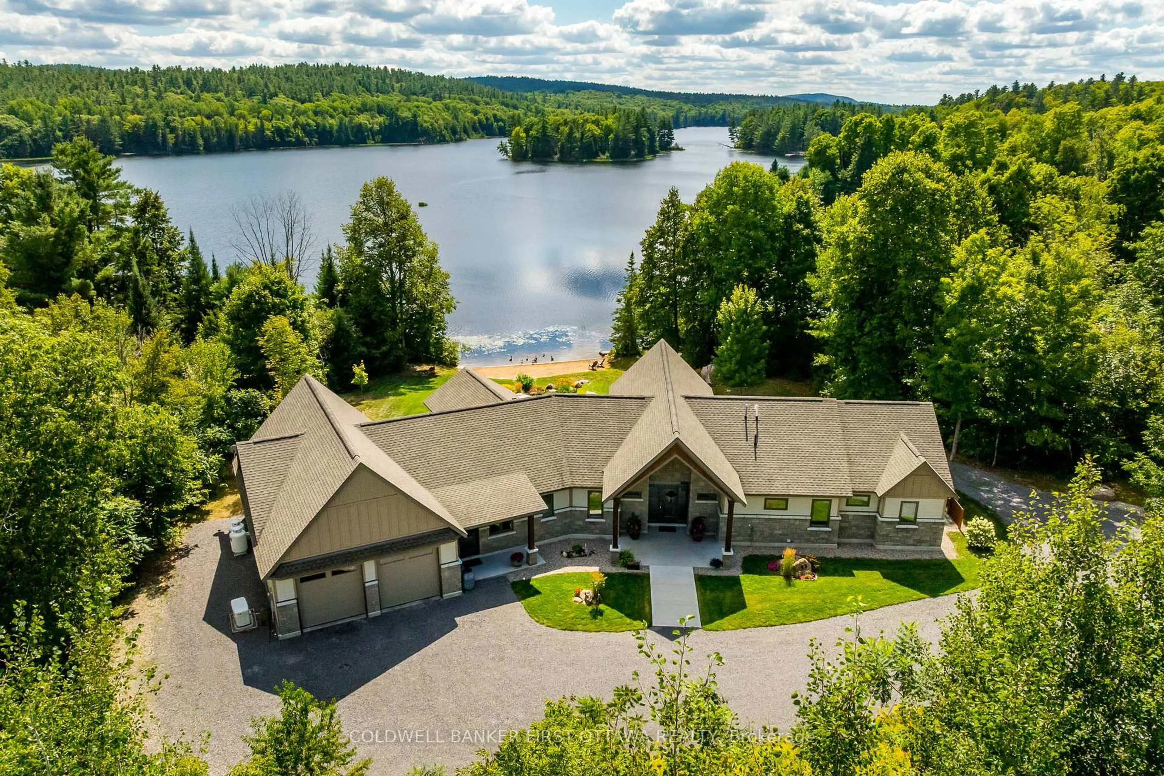 A pic from outside/outdoor area/front of a property/back of a property/a pic from drone, water/lake/river/ocean view for 36 CUB SCOUT Cres, Calabogie Ontario K0J 1H0