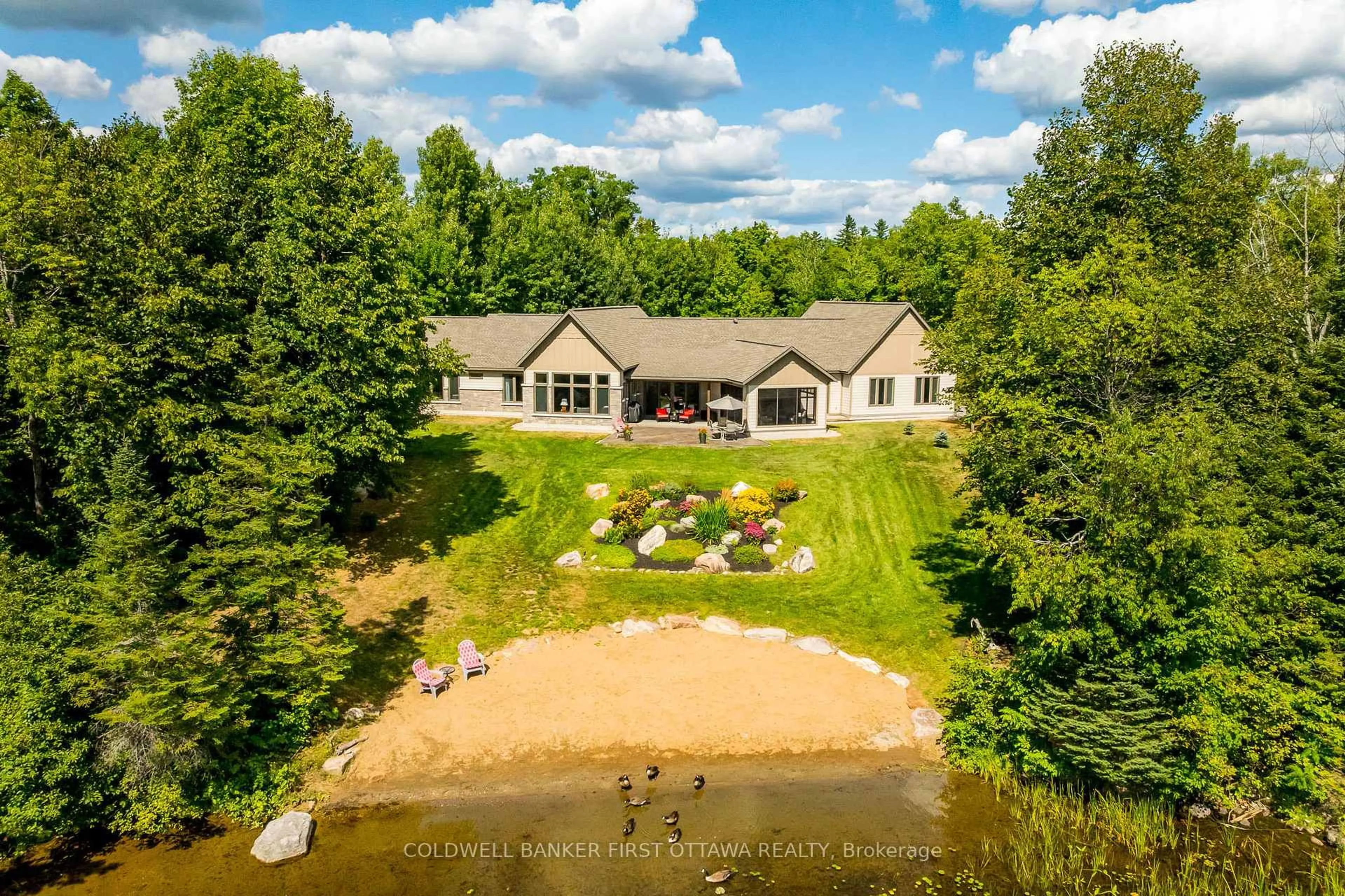 A pic from outside/outdoor area/front of a property/back of a property/a pic from drone, water/lake/river/ocean view for 36 CUB SCOUT Cres, Calabogie Ontario K0J 1H0
