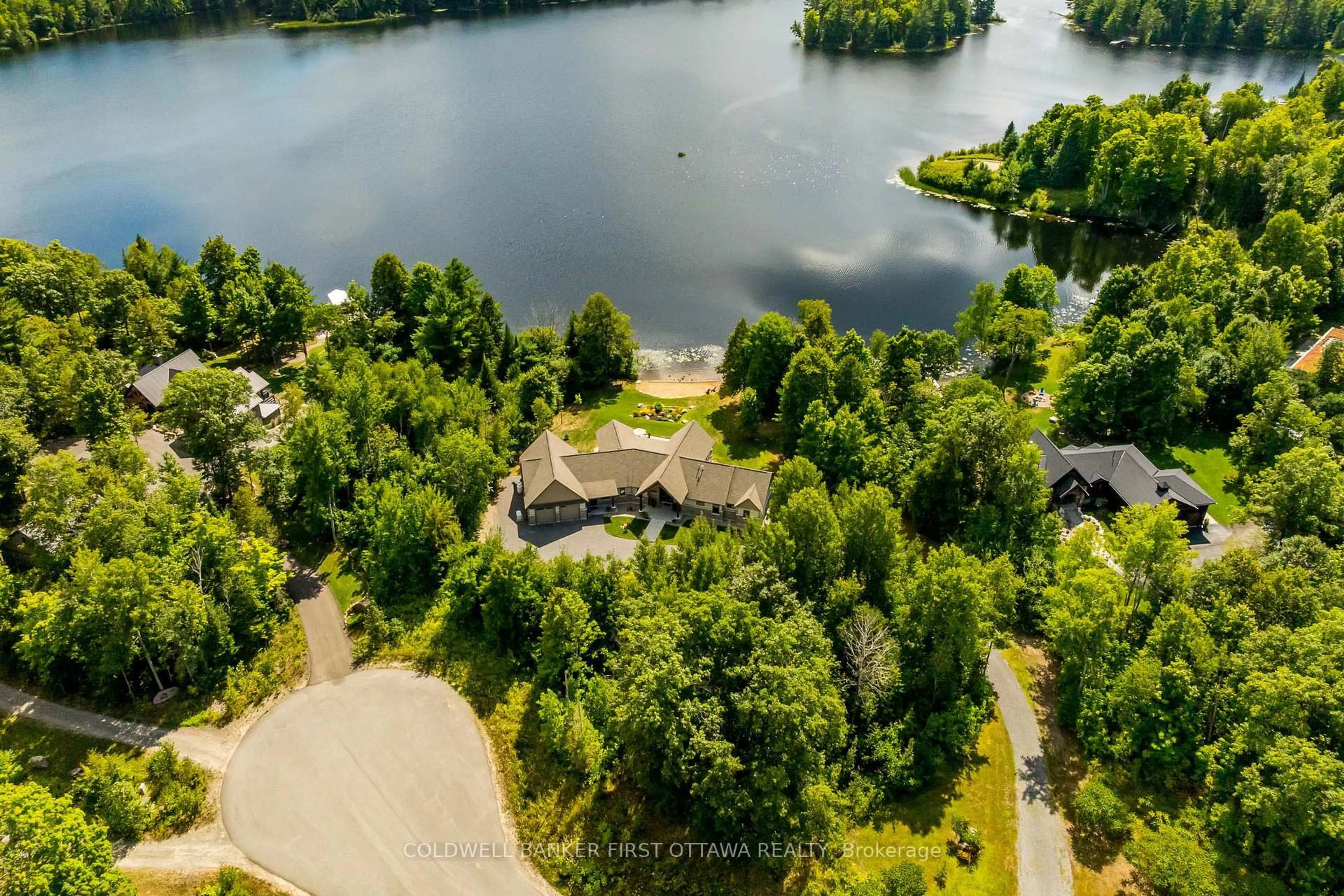 A pic from outside/outdoor area/front of a property/back of a property/a pic from drone, water/lake/river/ocean view for 36 CUB SCOUT Cres, Calabogie Ontario K0J 1H0