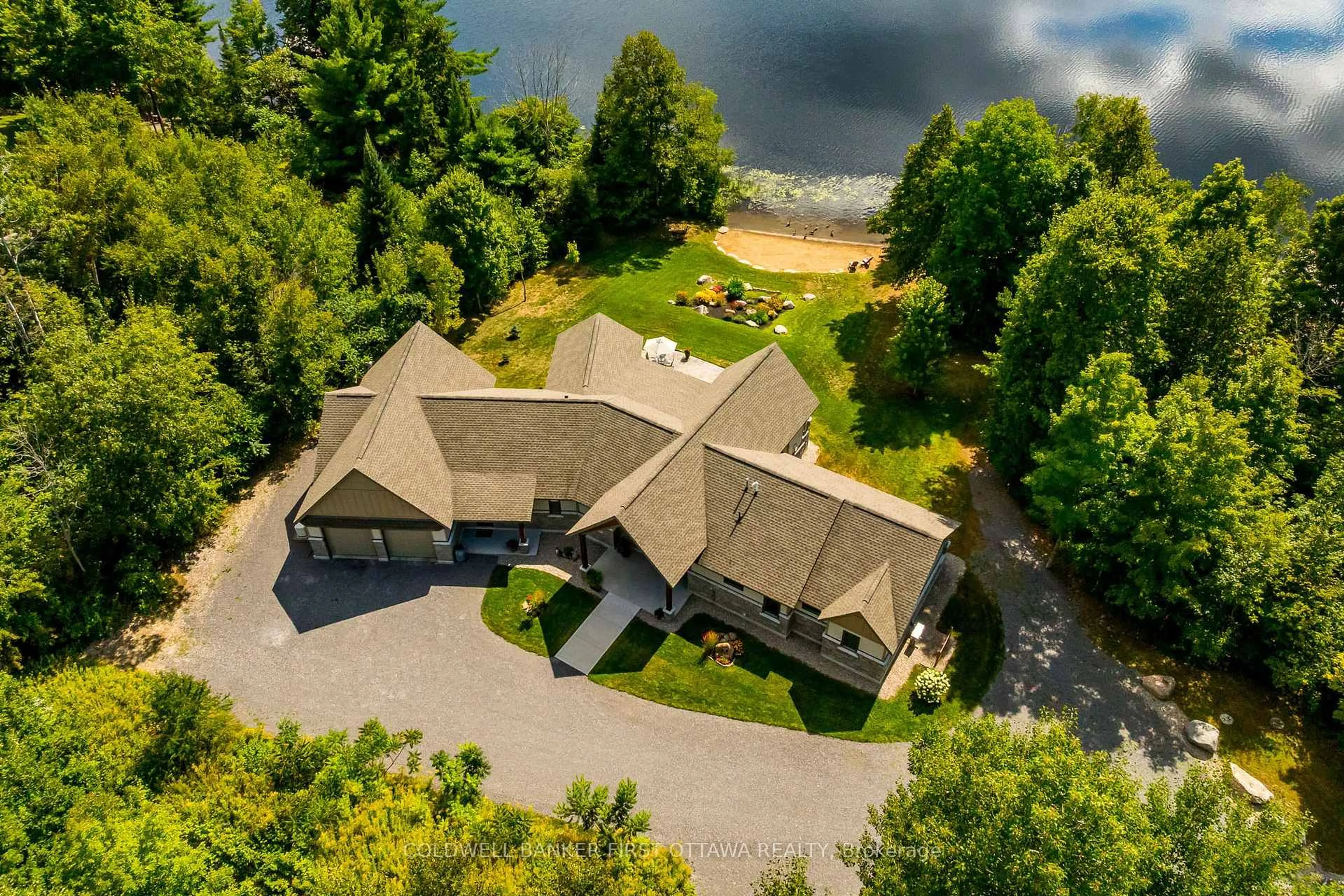 A pic from outside/outdoor area/front of a property/back of a property/a pic from drone, water/lake/river/ocean view for 36 CUB SCOUT Cres, Calabogie Ontario K0J 1H0