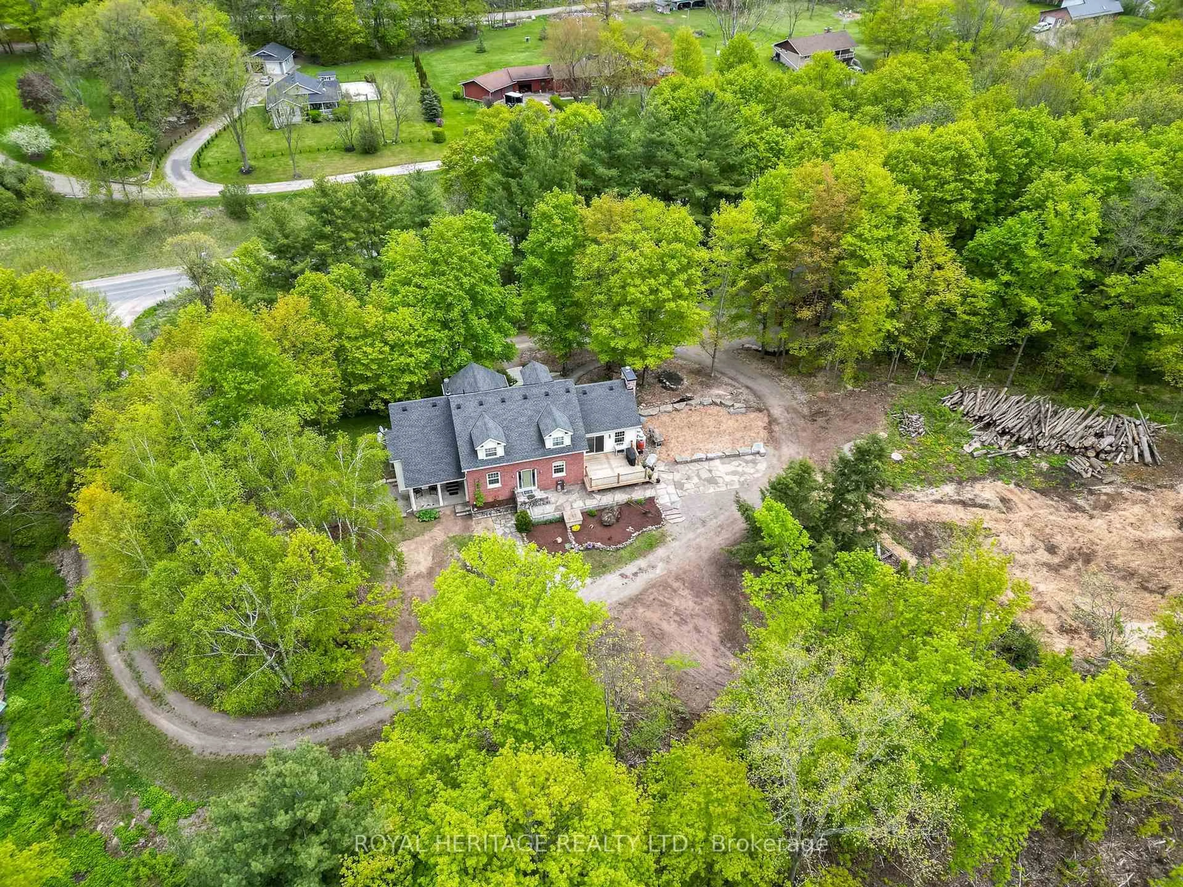 A pic from outside/outdoor area/front of a property/back of a property/a pic from drone, forest/trees view for 699 Cooper Rd, Madoc Ontario K0K 2K0