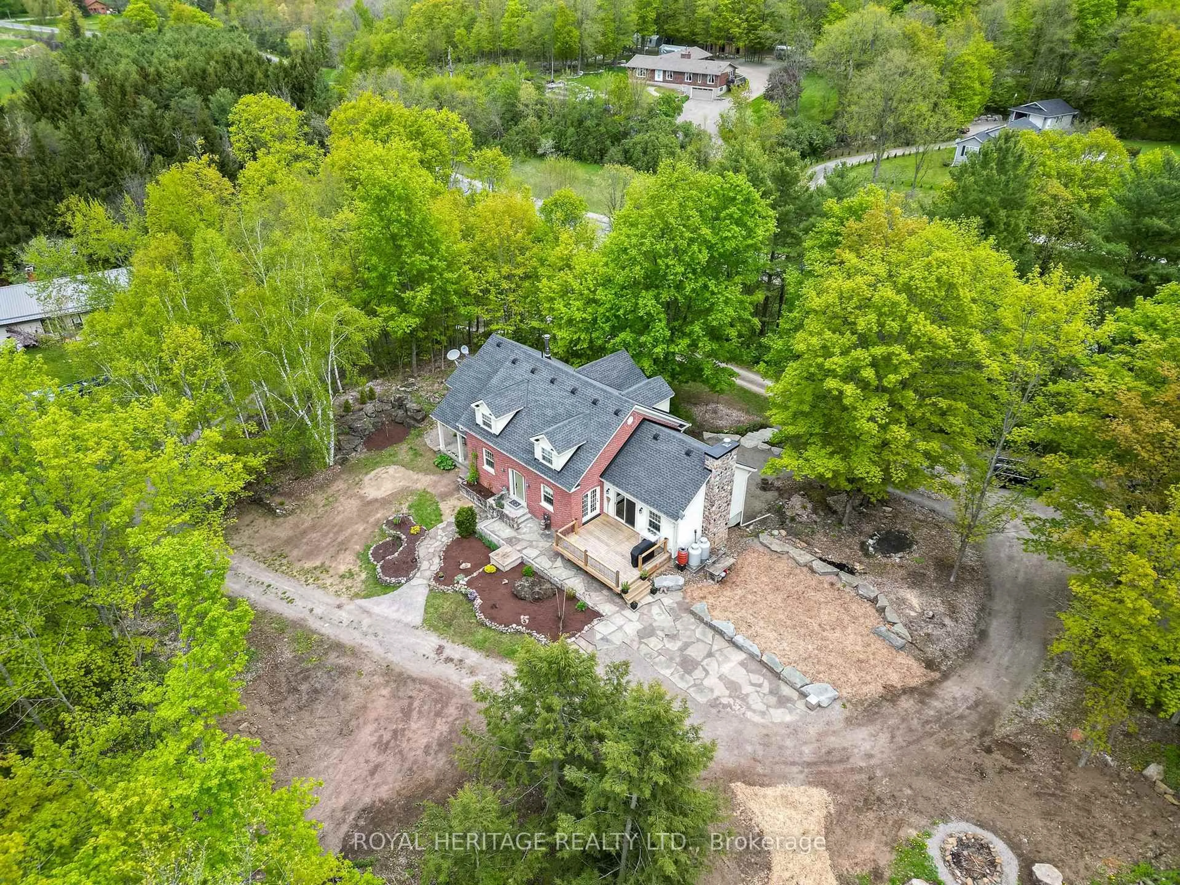 A pic from outside/outdoor area/front of a property/back of a property/a pic from drone, forest/trees view for 699 Cooper Rd, Madoc Ontario K0K 2K0