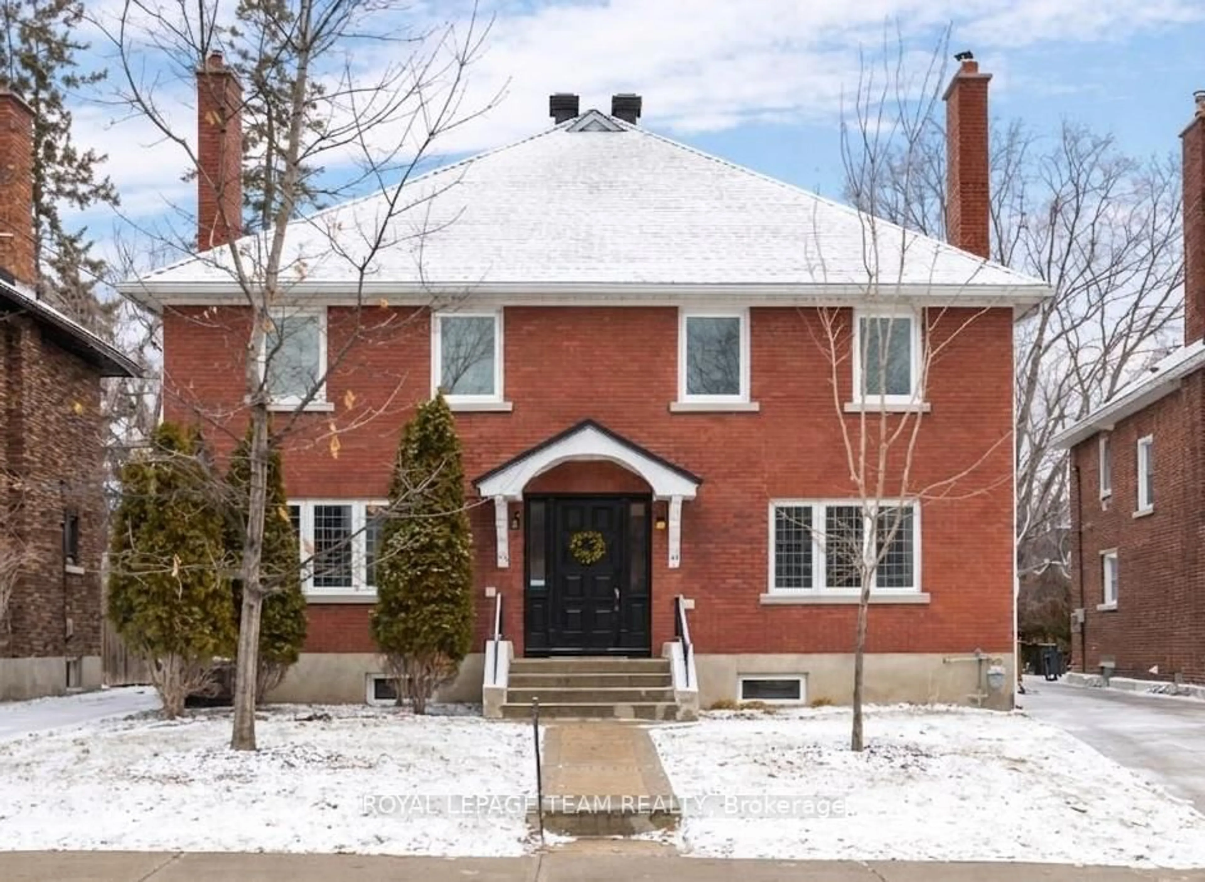 Home with brick exterior material, street for 45 Harmer Ave, Ottawa Ontario K1Y 0T5