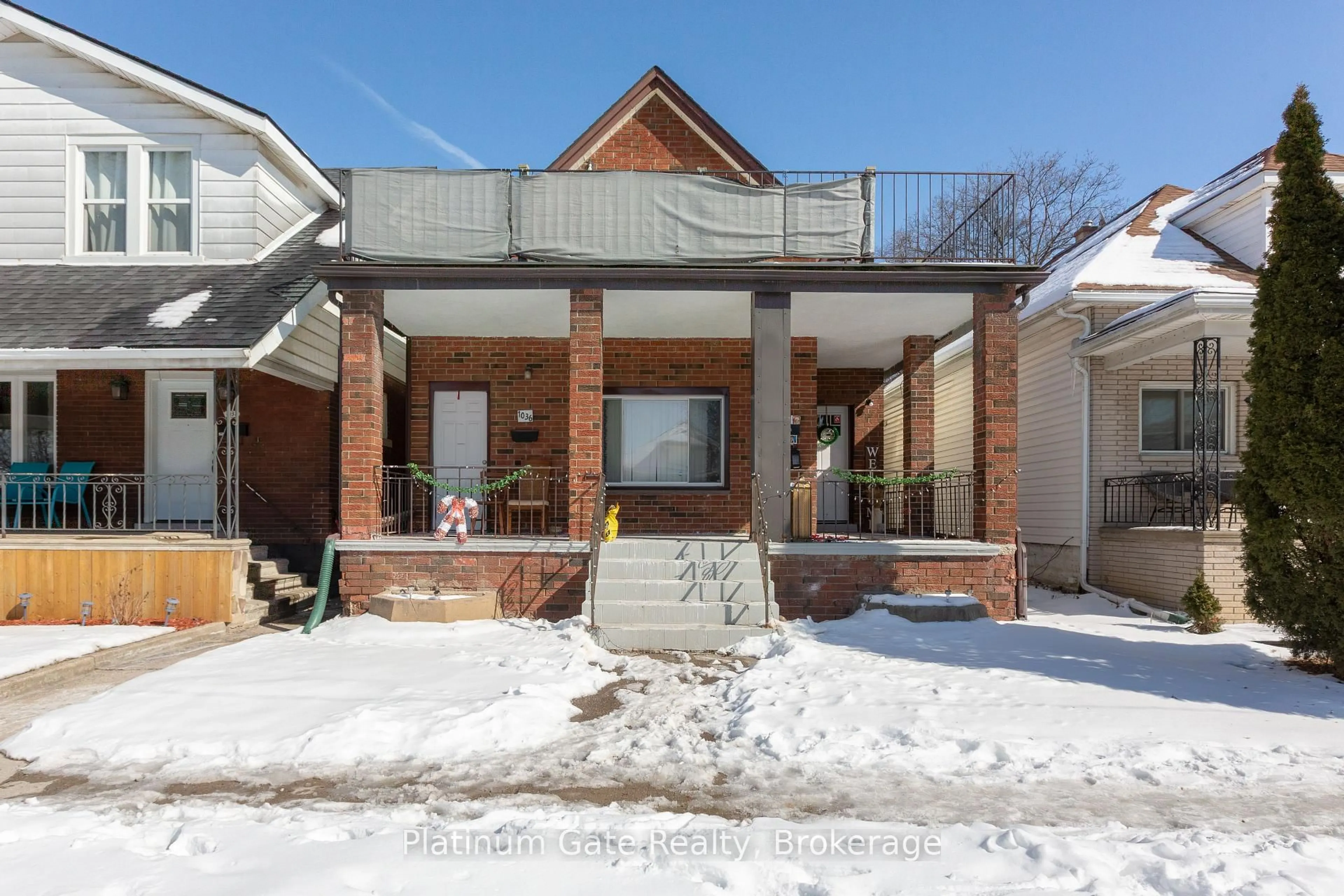 Home with brick exterior material, street for 1036-40 Gladstone Ave, Windsor Ontario N9A 2R8