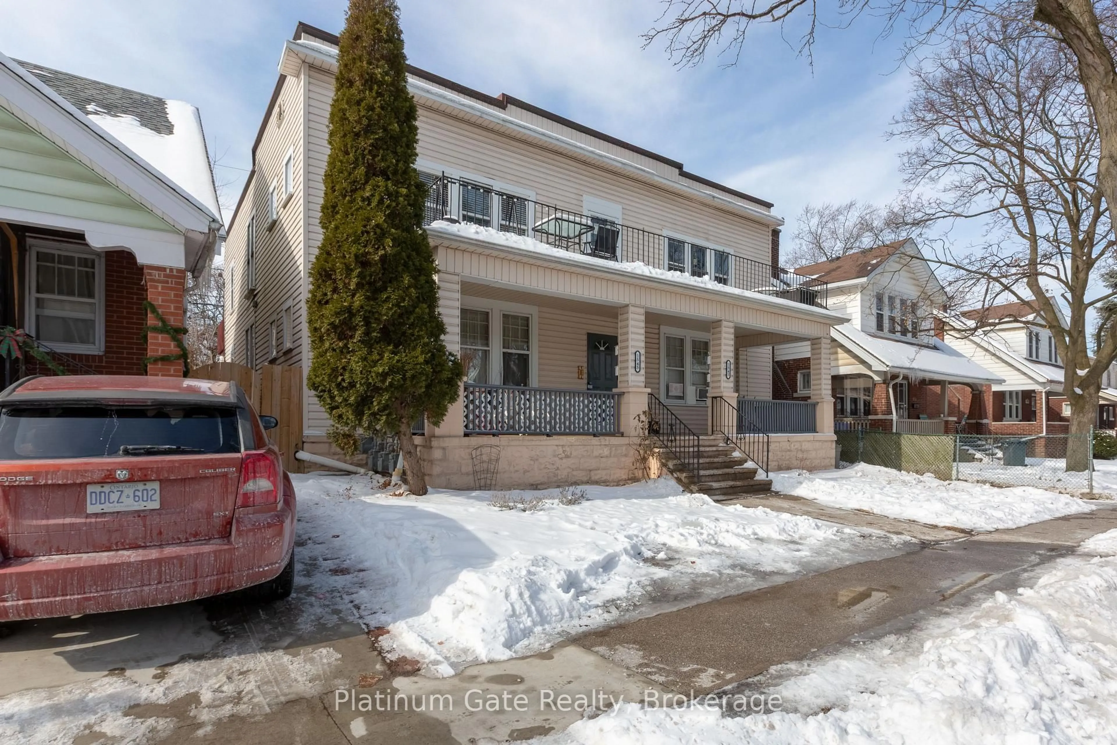 Home with brick exterior material, street for 1543-45 Church St, Windsor Ontario N8N 1V4