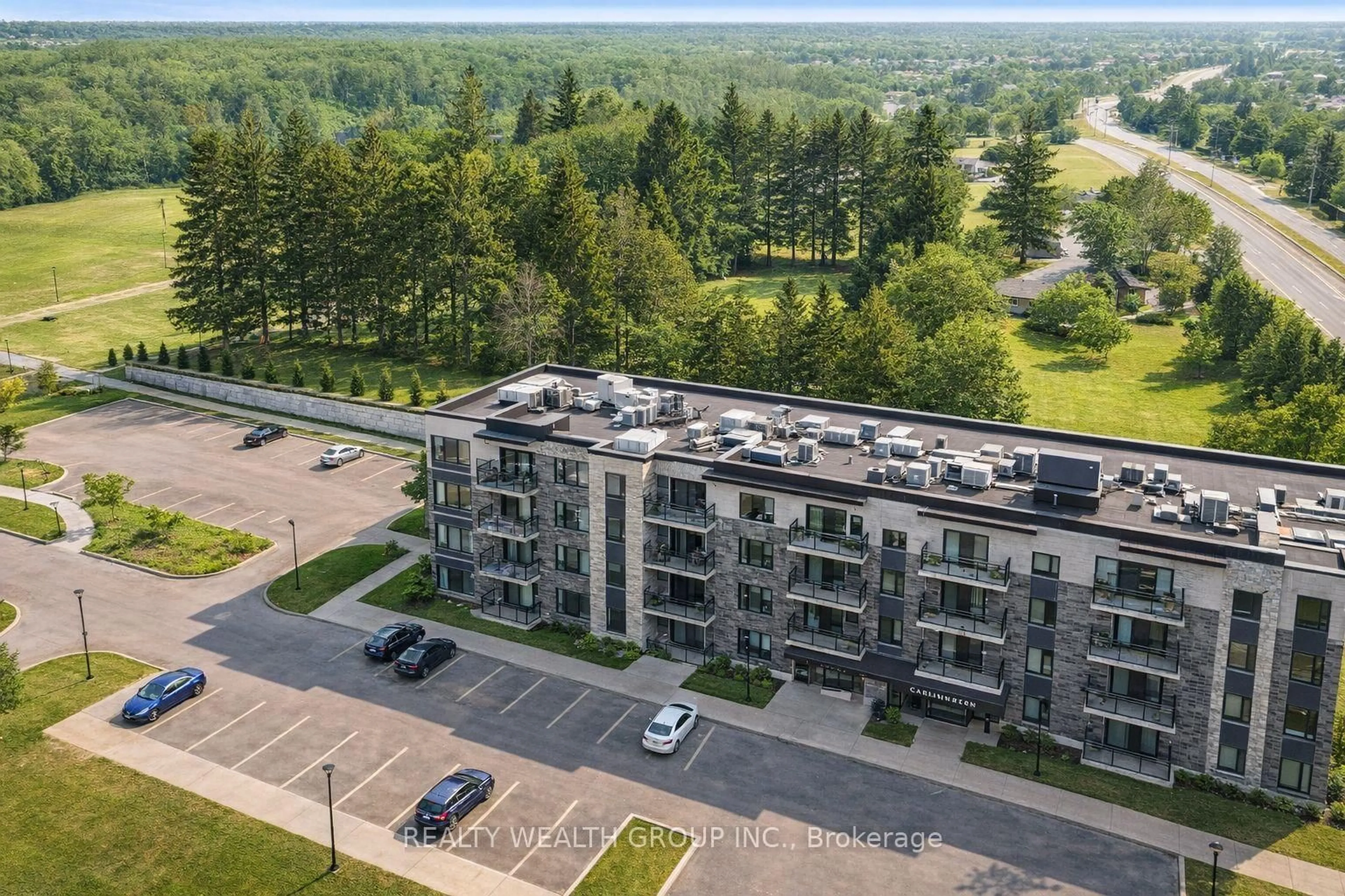 A pic from outside/outdoor area/front of a property/back of a property/a pic from drone, unknown for 1201 Lackner Pl #308, Kitchener Ontario N2A 0L4