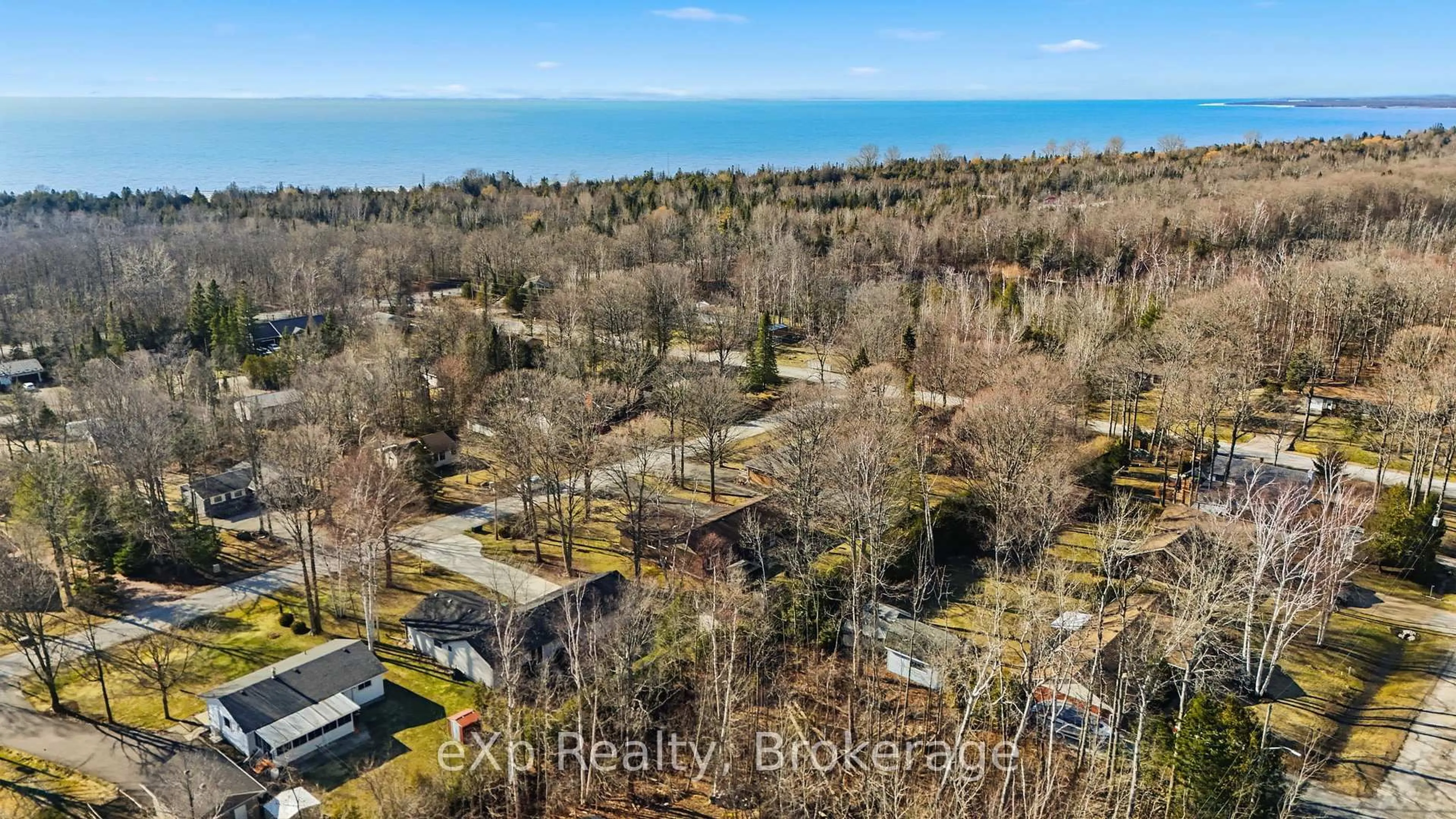 A pic from outside/outdoor area/front of a property/back of a property/a pic from drone, water/lake/river/ocean view for 90 Mapleport Cres, South Bruce Peninsula Ontario N0H 2G0