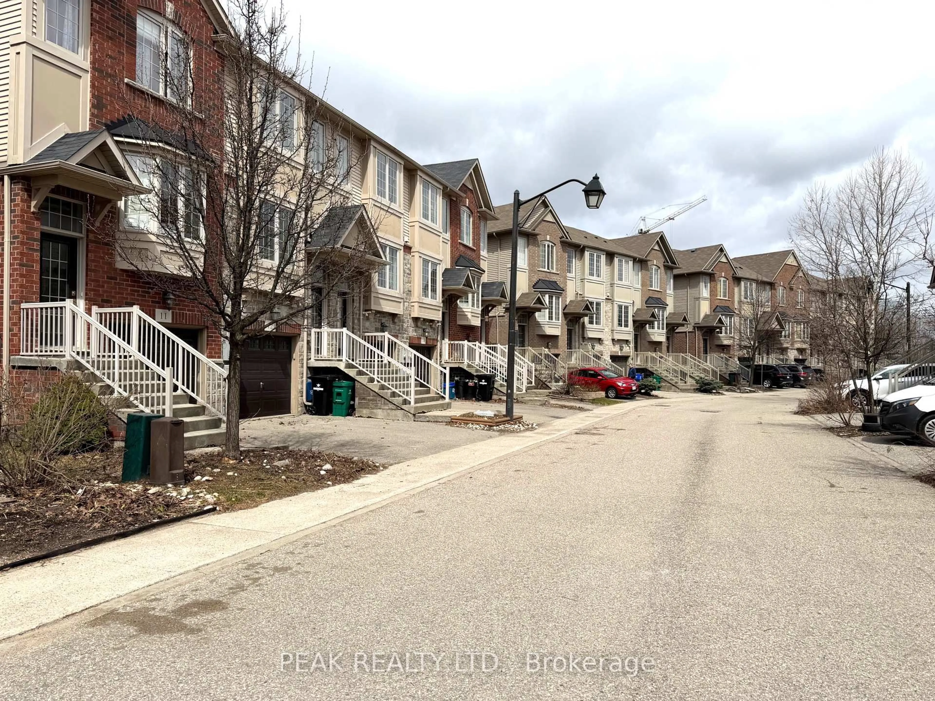 A pic from outside/outdoor area/front of a property/back of a property/a pic from drone, street for 342 Mill St #10, Kitchener Ontario N2M 0A4