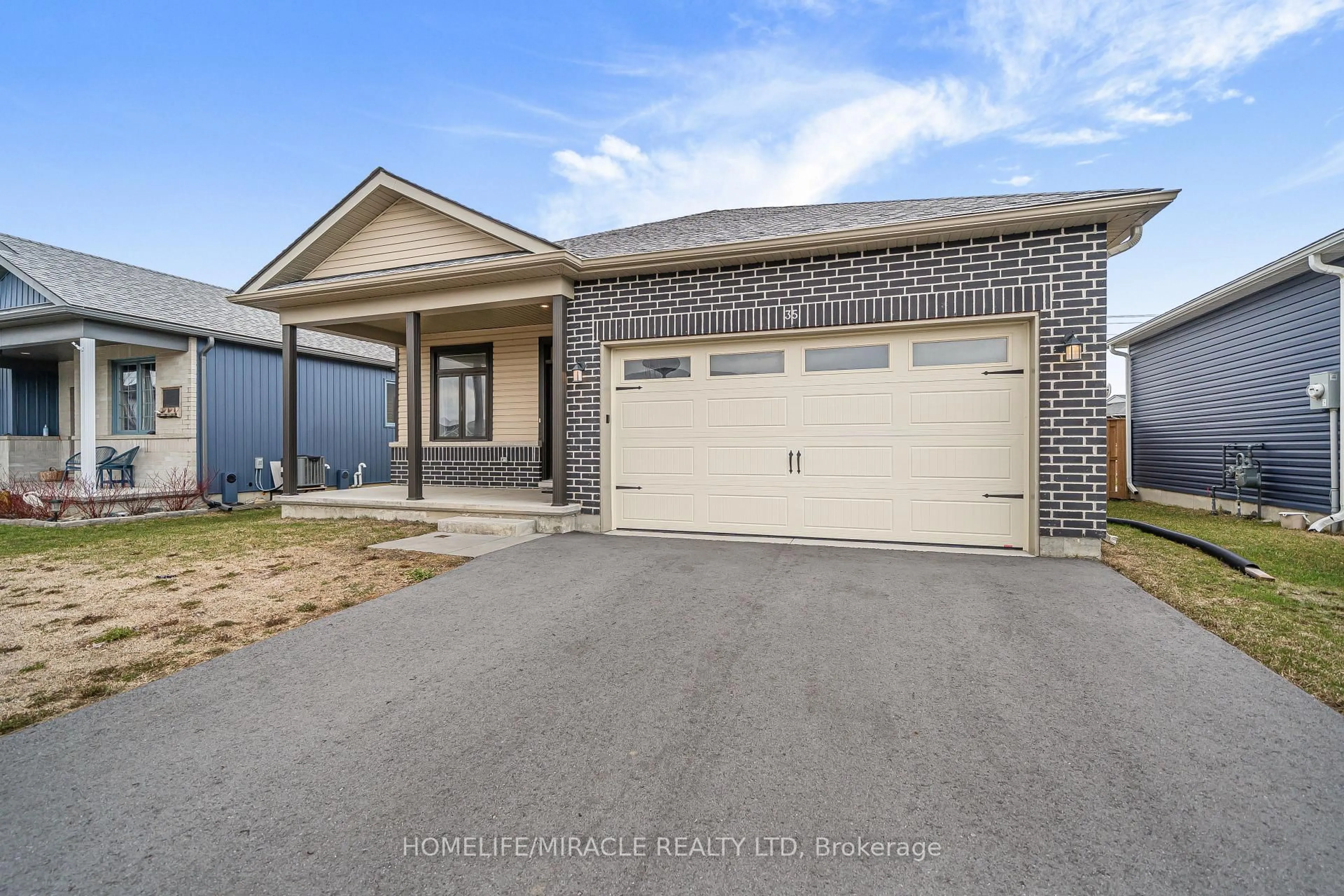 Home with brick exterior material, street for 35 Allen St, Prince Edward County Ontario K0K 2T0