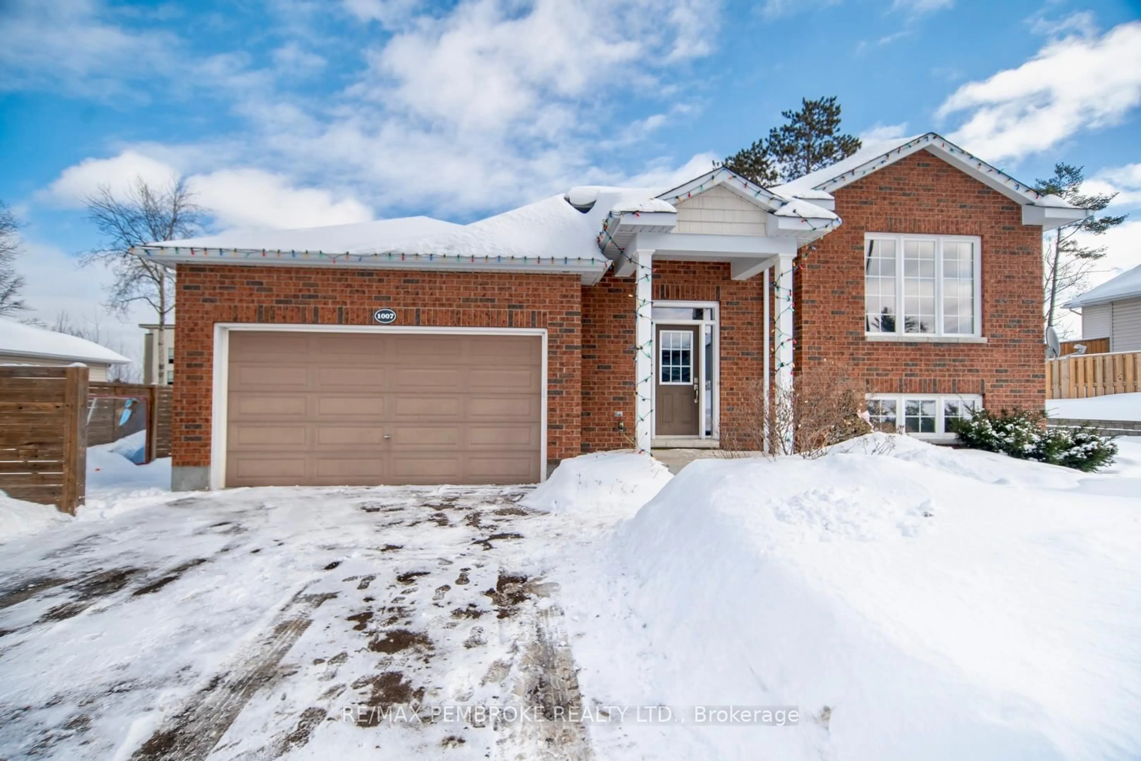 Home with brick exterior material, street for 1007 Butler Blvd, Petawawa Ontario K8H 0B7