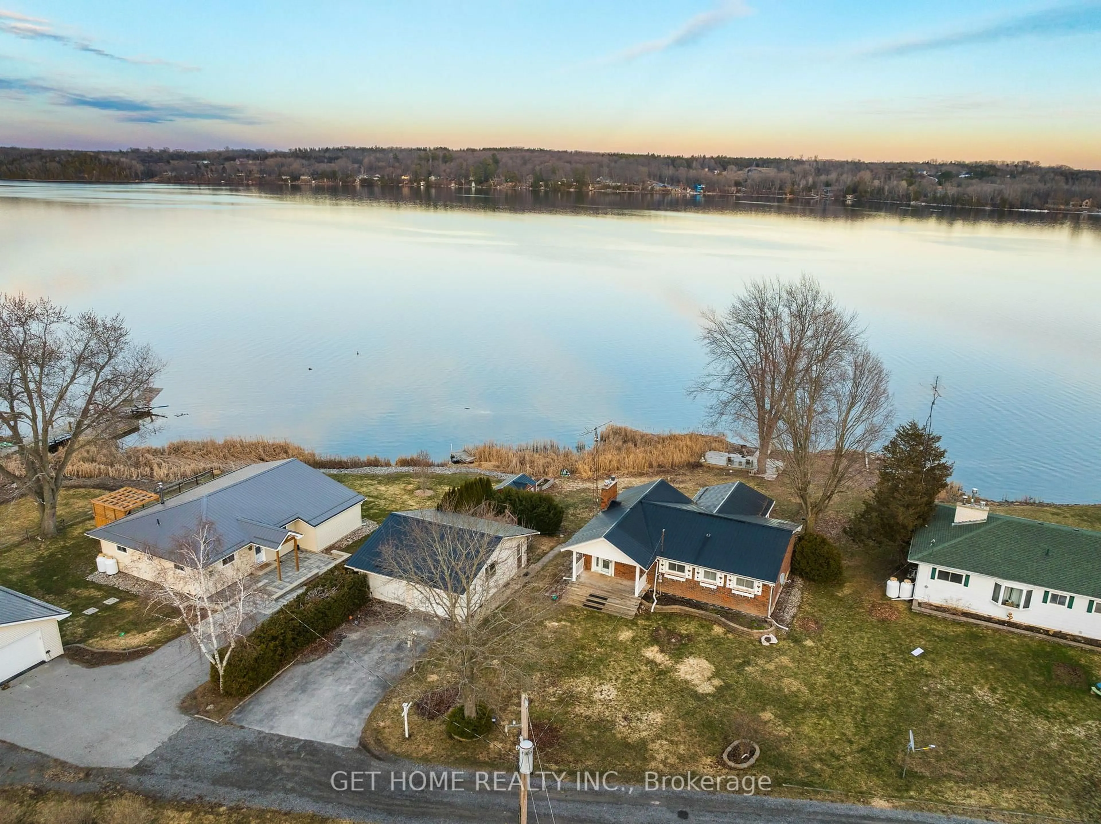 A pic from outside/outdoor area/front of a property/back of a property/a pic from drone, water/lake/river/ocean view for 52 Pats Lane, Prince Edward County Ontario K0K 2T0