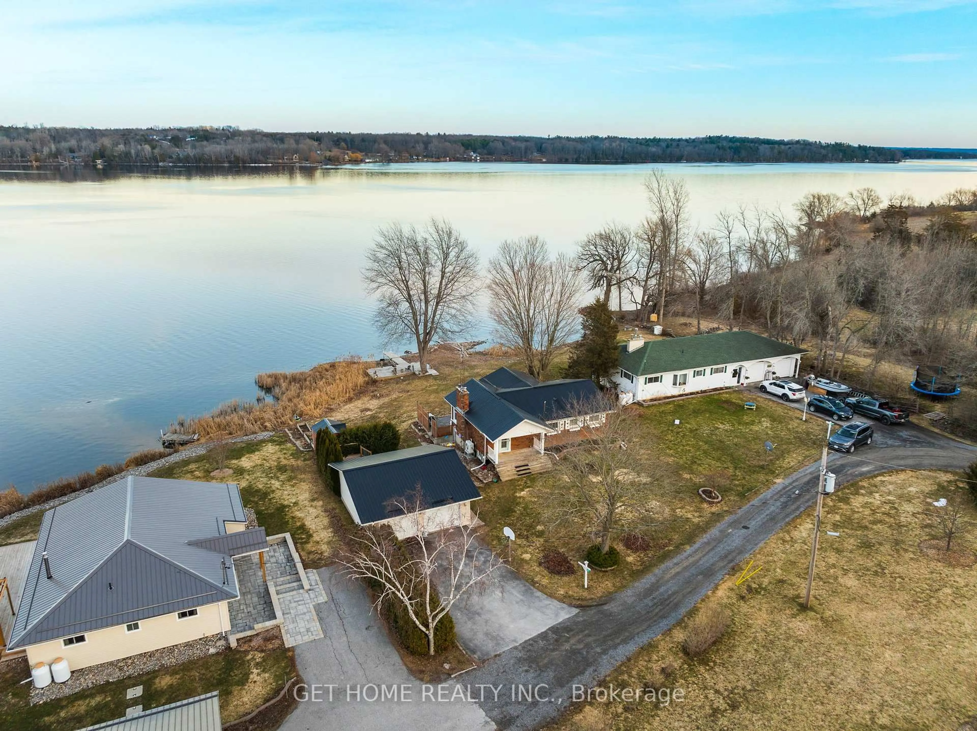 A pic from outside/outdoor area/front of a property/back of a property/a pic from drone, water/lake/river/ocean view for 52 Pats Lane, Prince Edward County Ontario K0K 2T0
