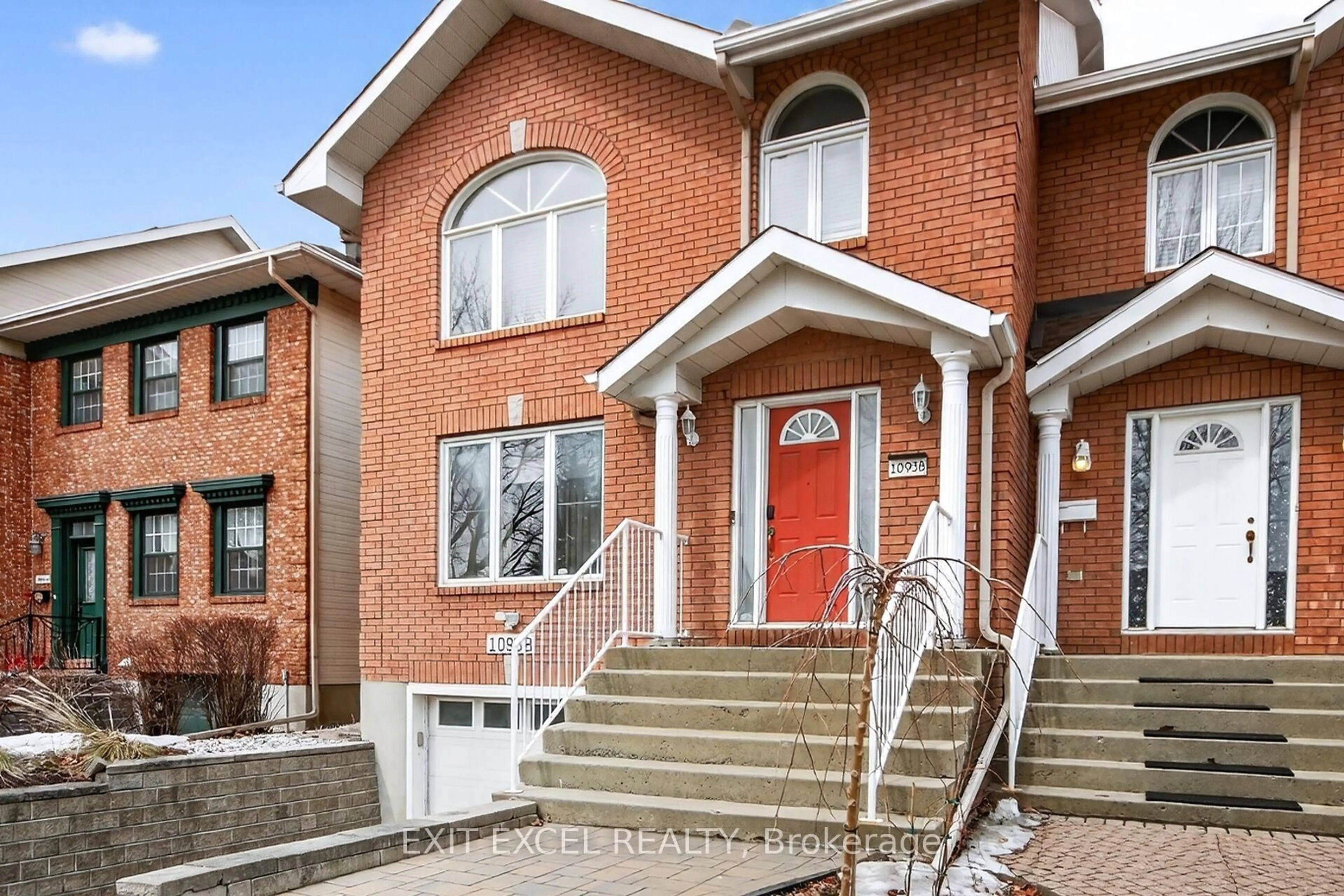 Home with brick exterior material, street for 1093-B Normandy Normandy Cres, Ottawa Ontario K2C 0L9