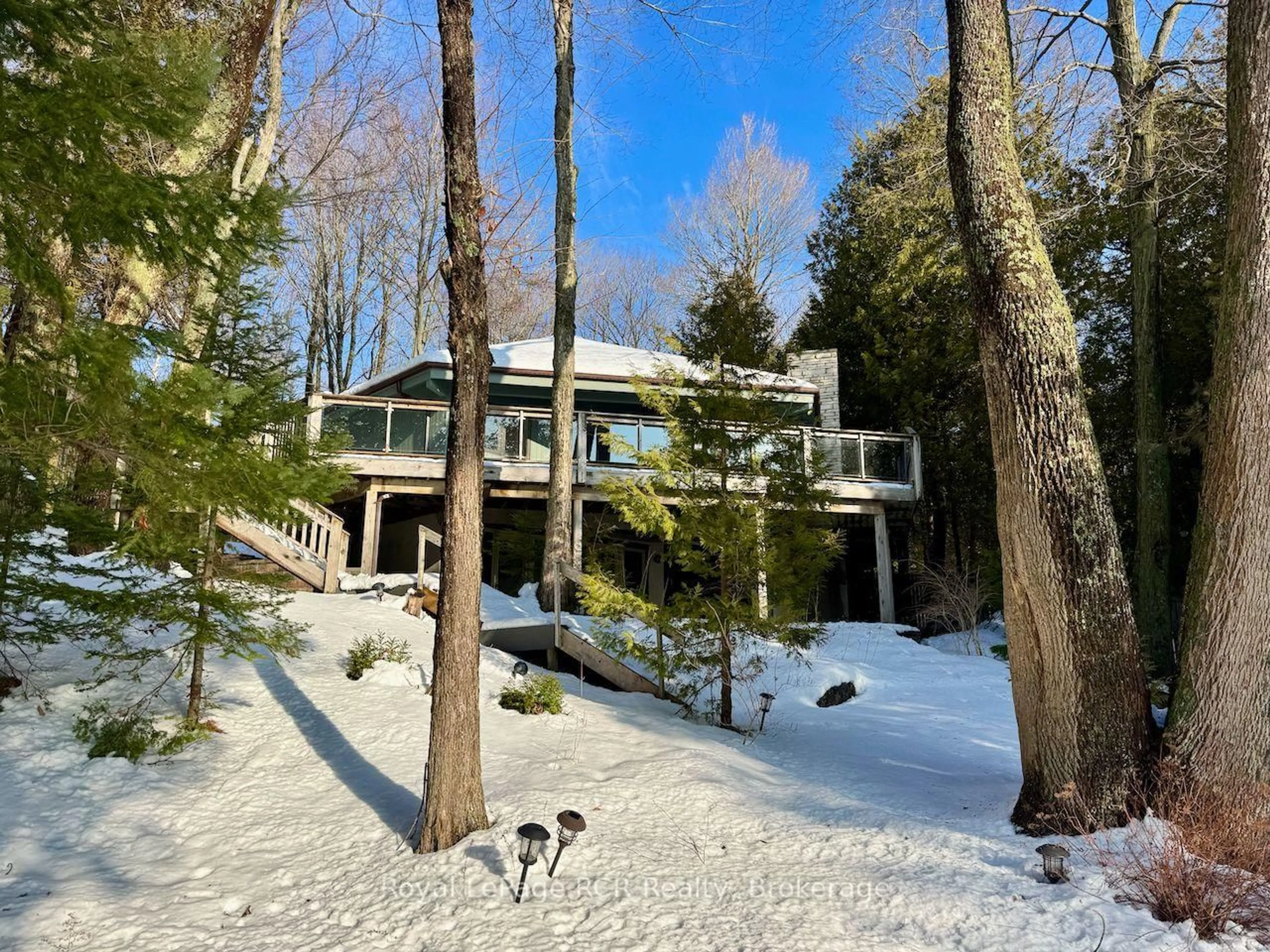 A pic from outside/outdoor area/front of a property/back of a property/a pic from drone, forest/trees view for 15 Georgian Dr, Northern Bruce Peninsula Ontario N0H 1W0