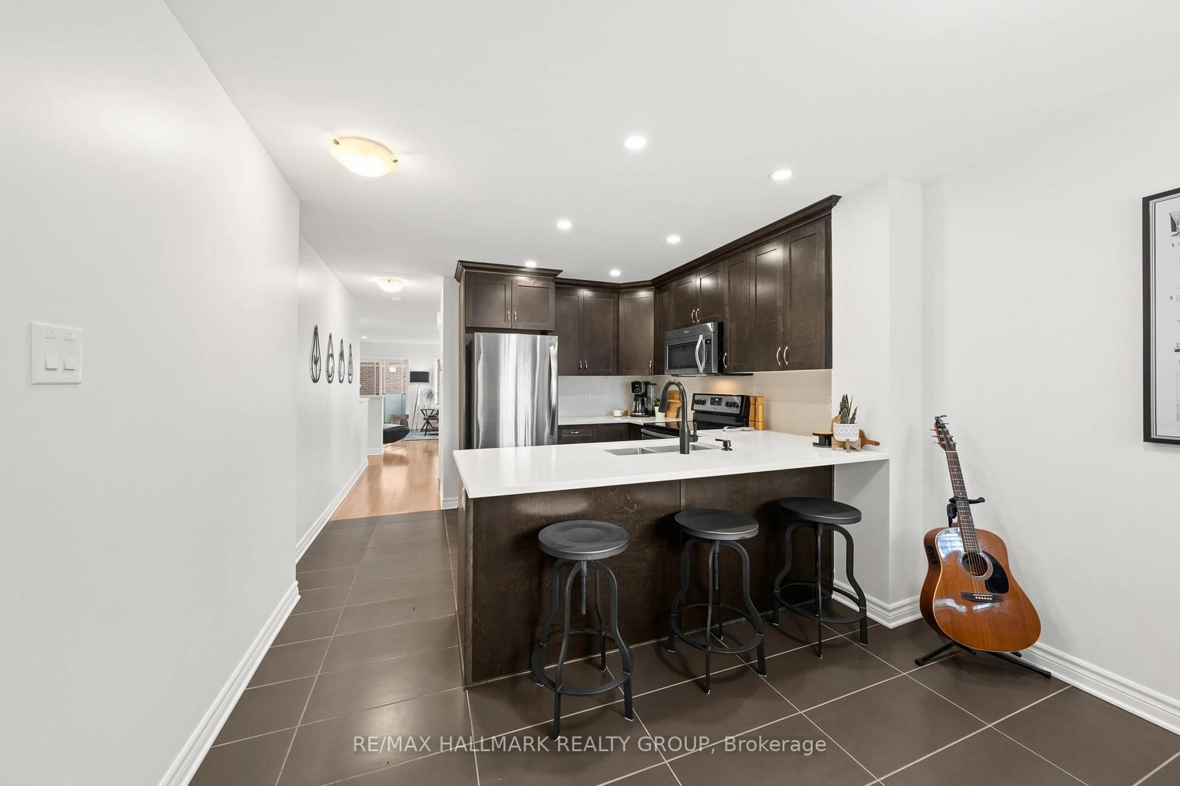 Open concept kitchen, ceramic/tile floor for 498 LeBoutillier Ave, Ottawa Ontario K1K 1V1