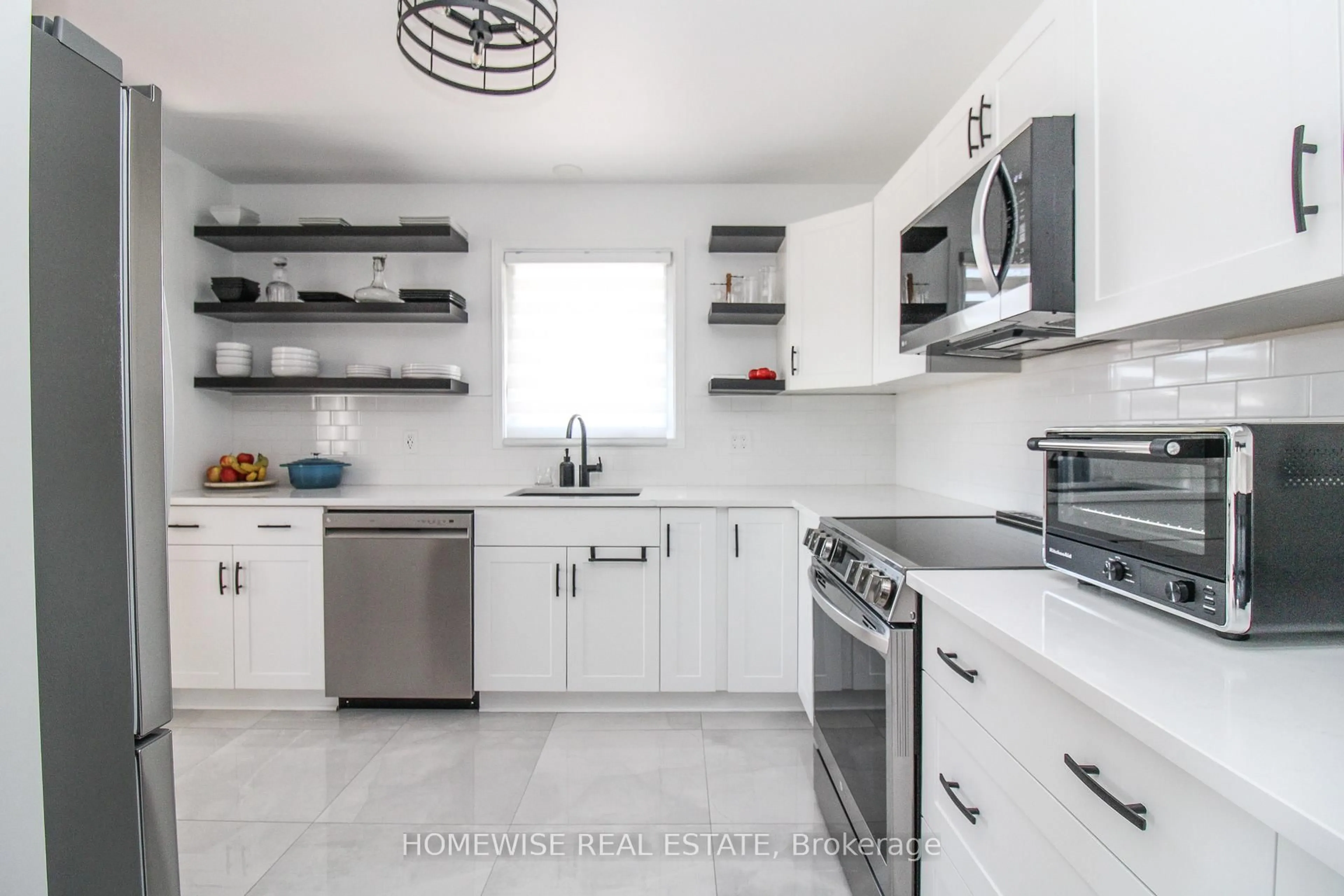 Open concept kitchen, ceramic/tile floor for 268 SPENCLEYS Lane, Peterborough Ontario K9H 1S3