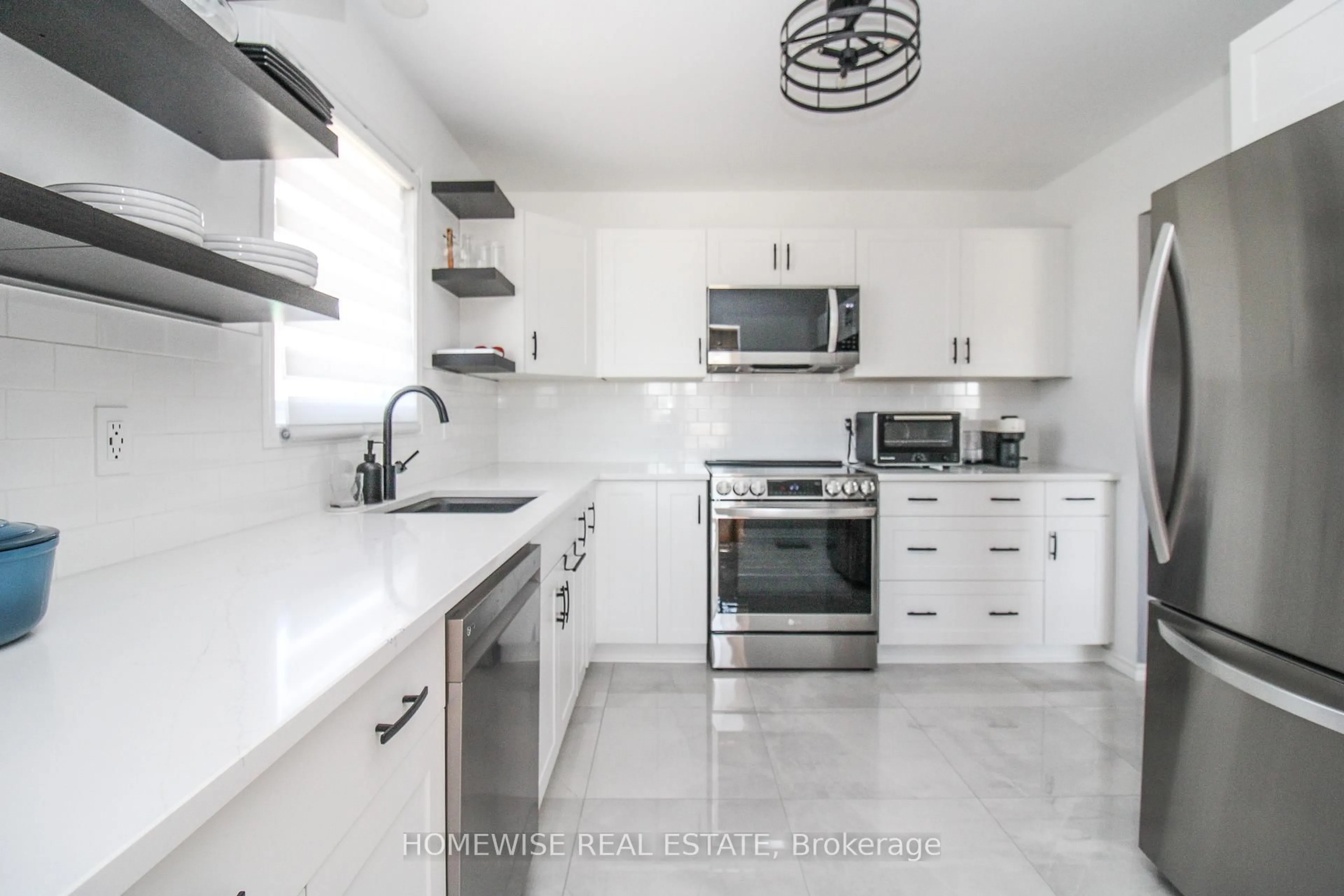 Open concept kitchen, ceramic/tile floor for 268 SPENCLEYS Lane, Peterborough Ontario K9H 1S3