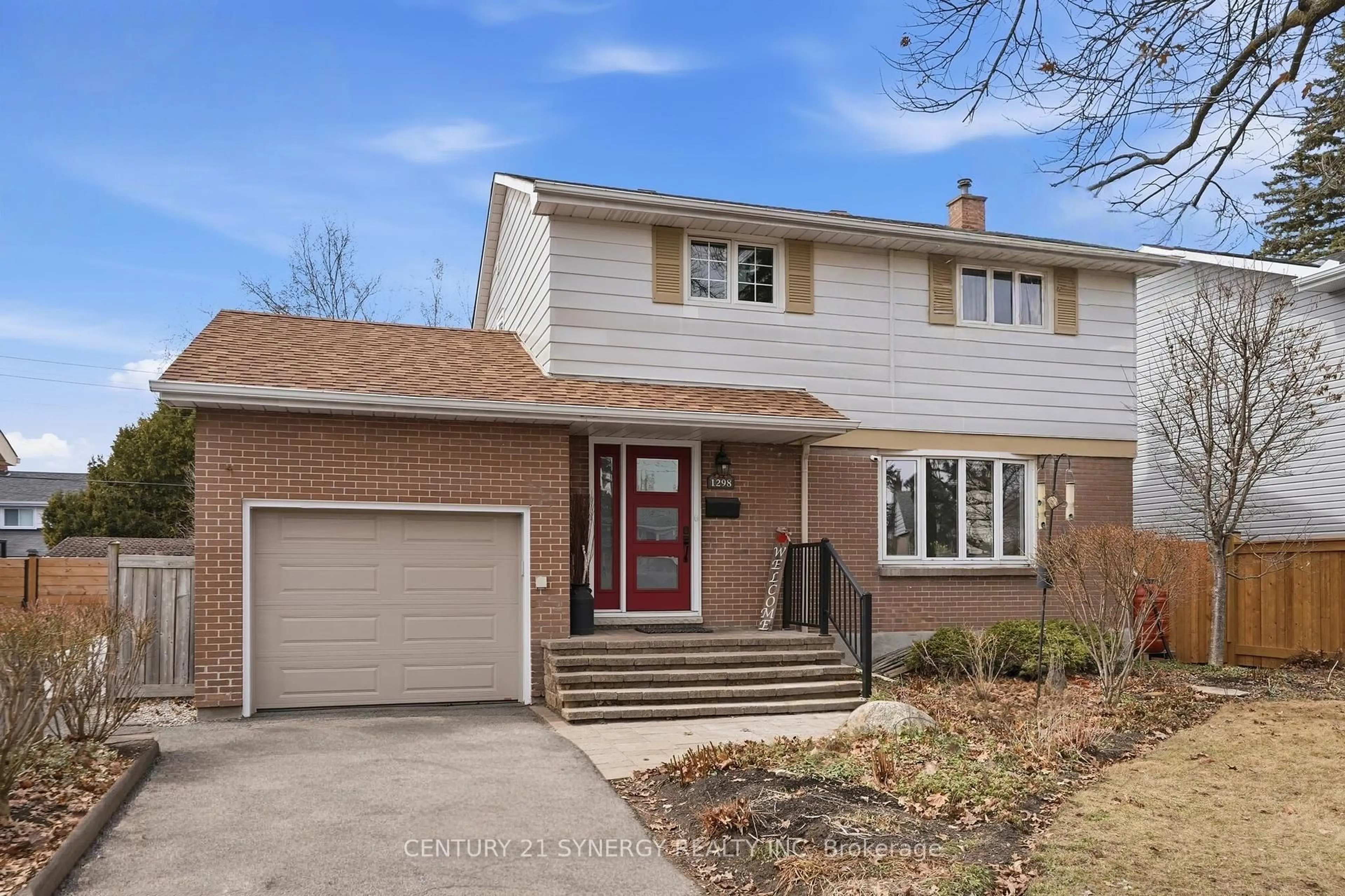 Home with brick exterior material, street for 1298 Woodside Dr, Ottawa Ontario K2C 2G9