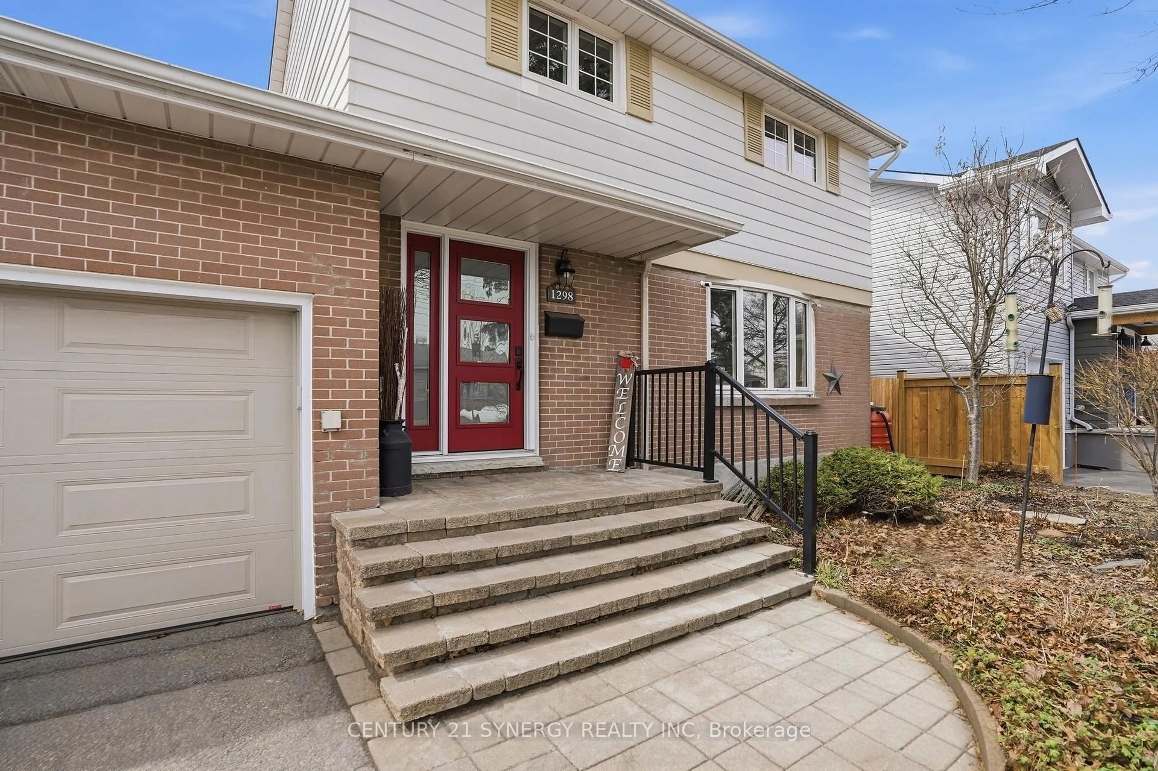 Home with brick exterior material, street for 1298 Woodside Dr, Ottawa Ontario K2C 2G9