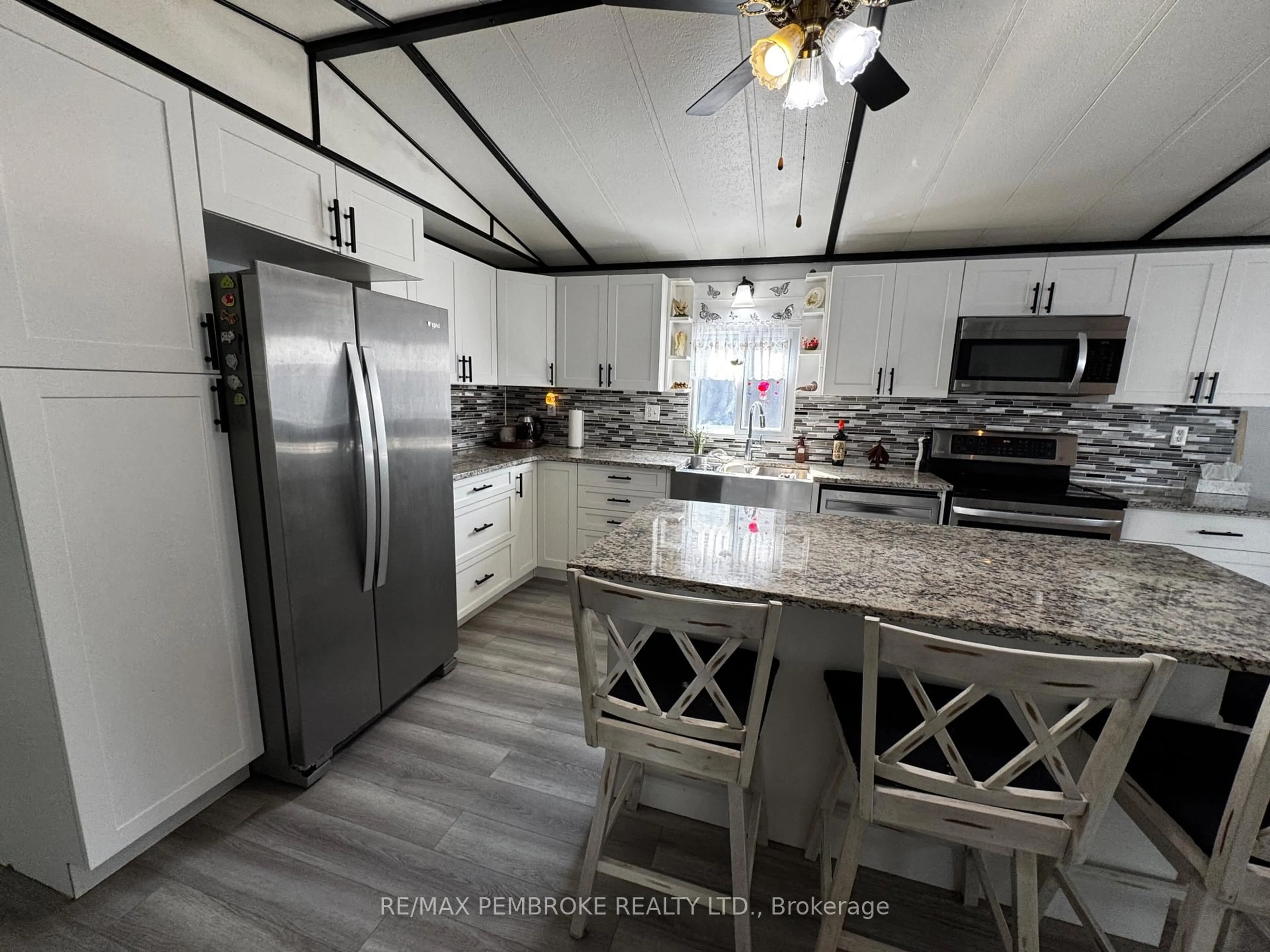 Open concept kitchen, ceramic/tile floor for 105 Pinehurst Estates, Petawawa Ontario K8H 2H2