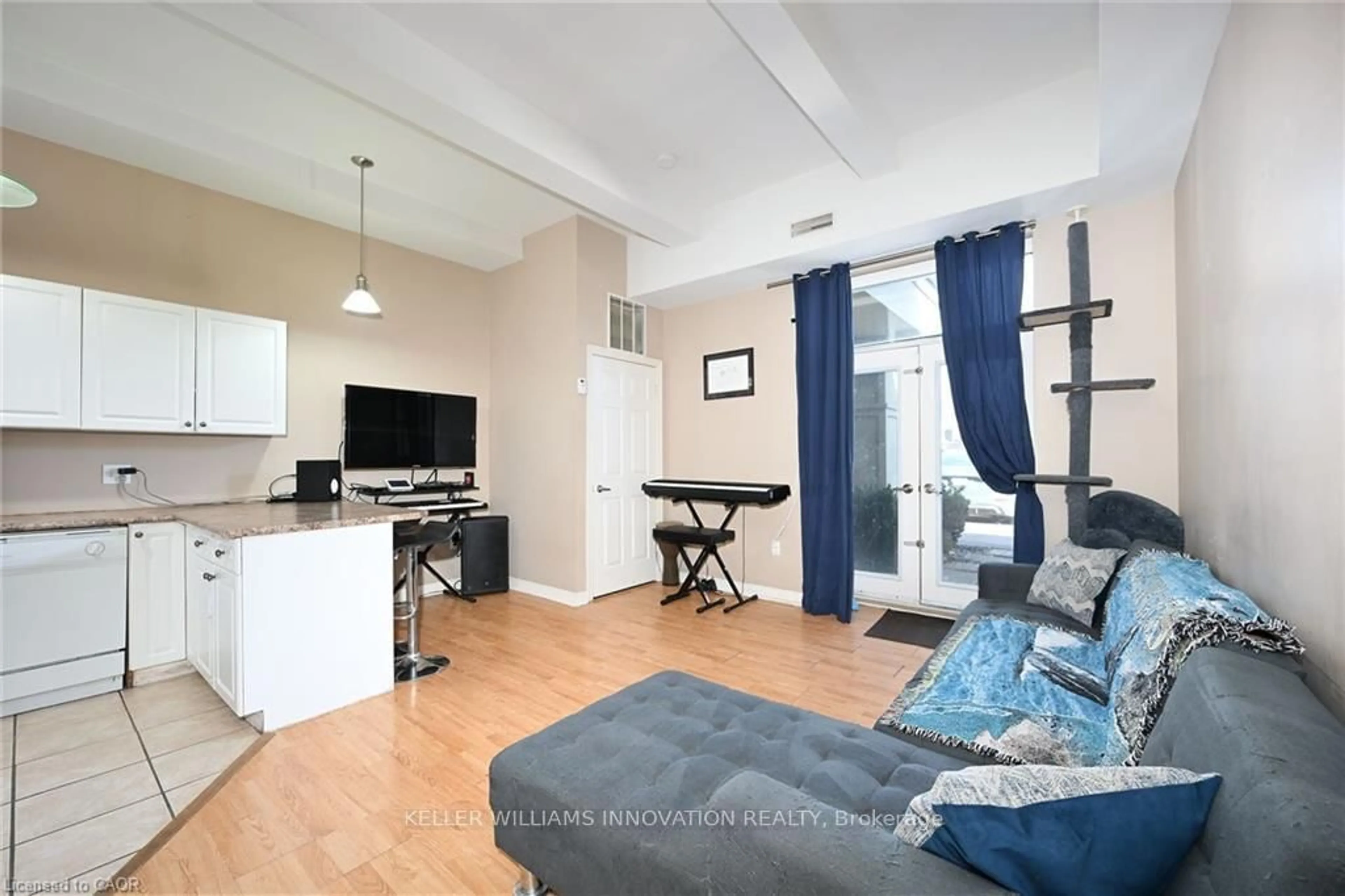 Living room with furniture, unknown for 6365 Drummond Rd #105, Niagara Falls Ontario L2G 4N1