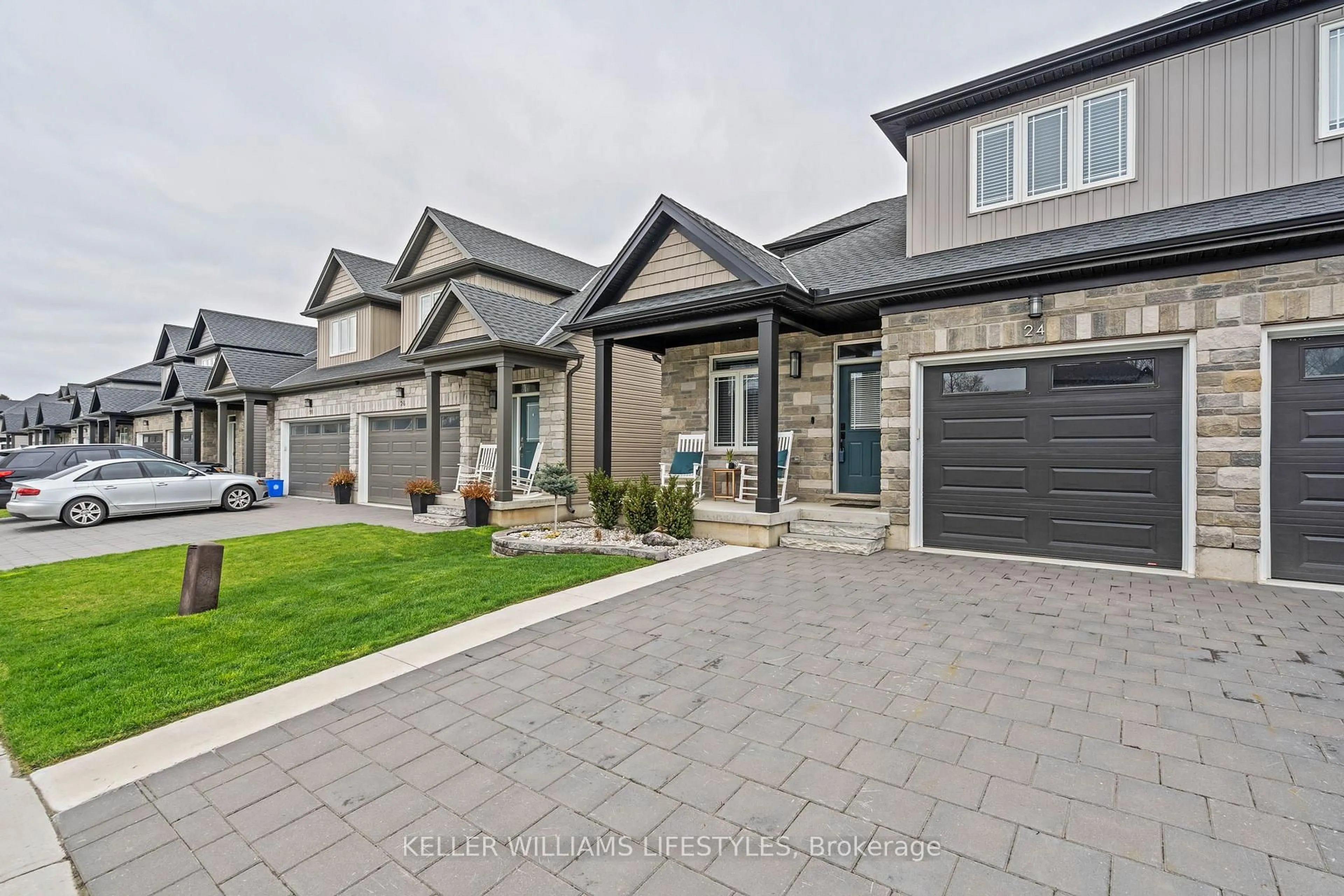 Home with brick exterior material, street for 24 Compass Tr, Central Elgin Ontario N5L 0B4