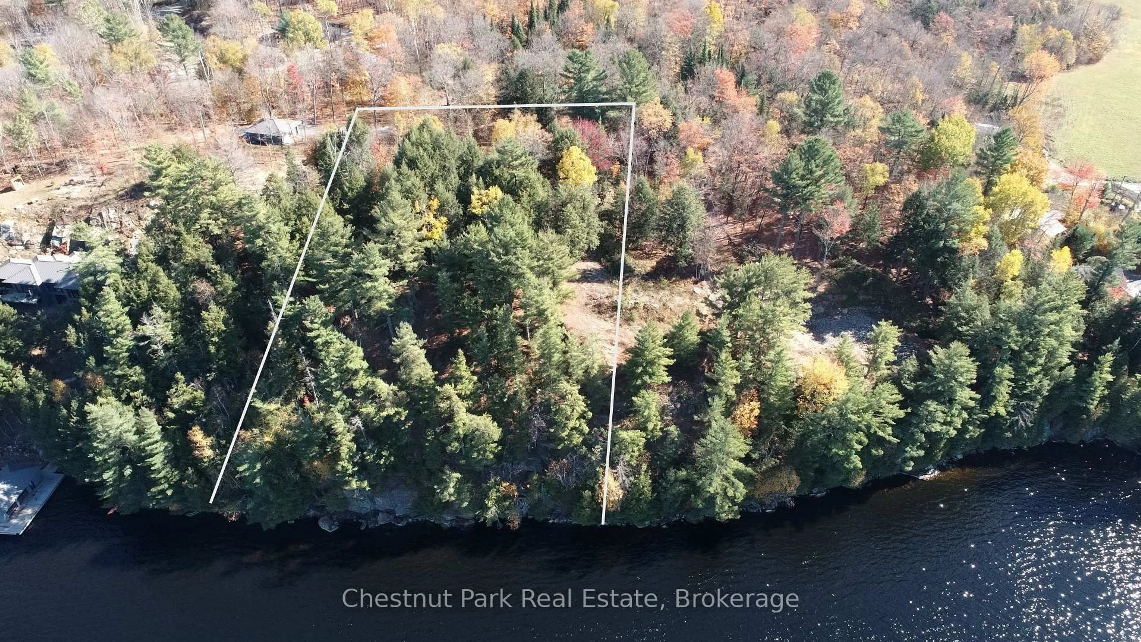 A pic from outside/outdoor area/front of a property/back of a property/a pic from drone, water/lake/river/ocean view for 536 SPRINGFIELD Rd, Huntsville Ontario P1H 0H9