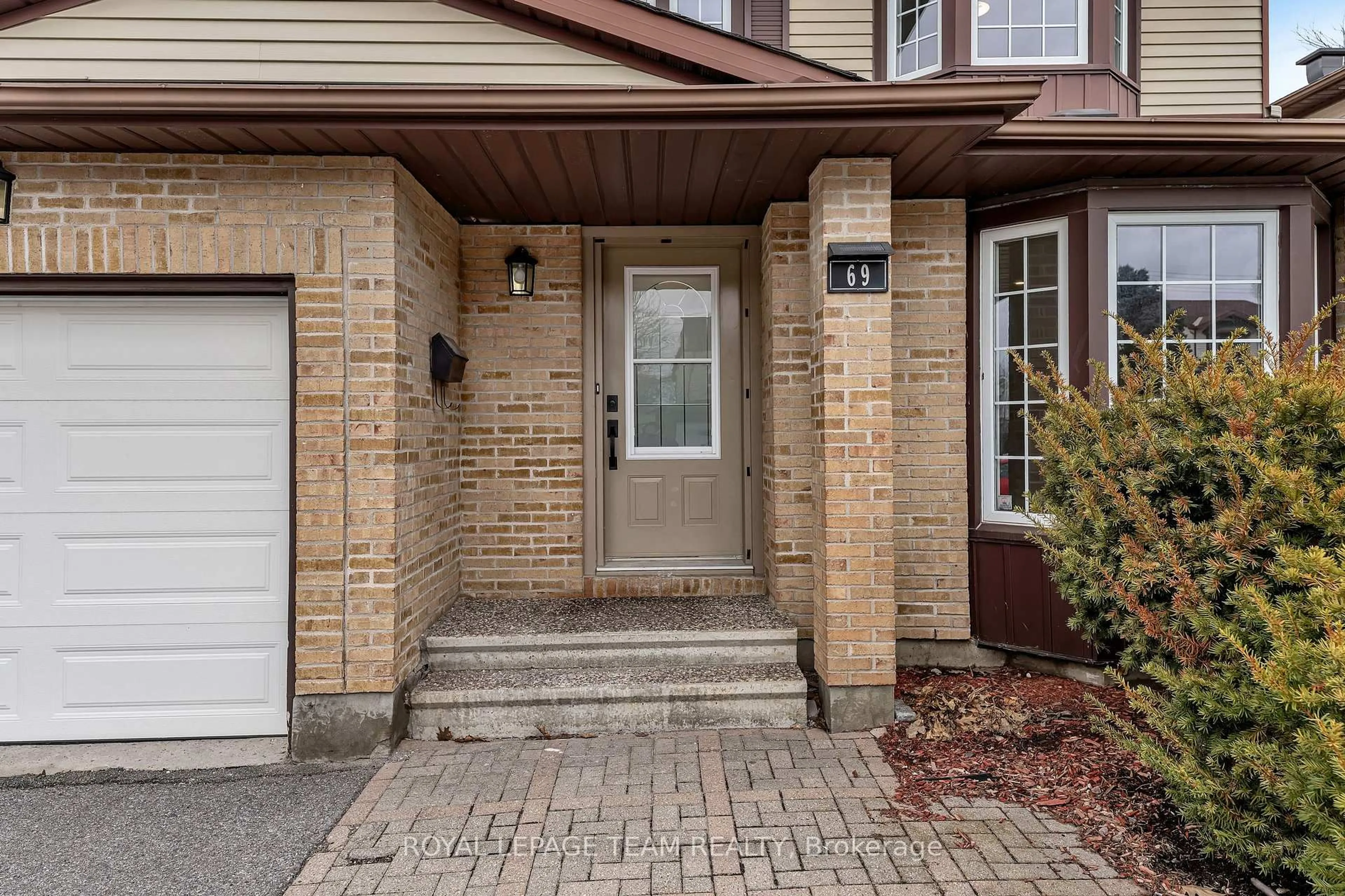 Home with brick exterior material, street for 69 Pinetrail Cres, Ottawa Ontario K2G 5B2
