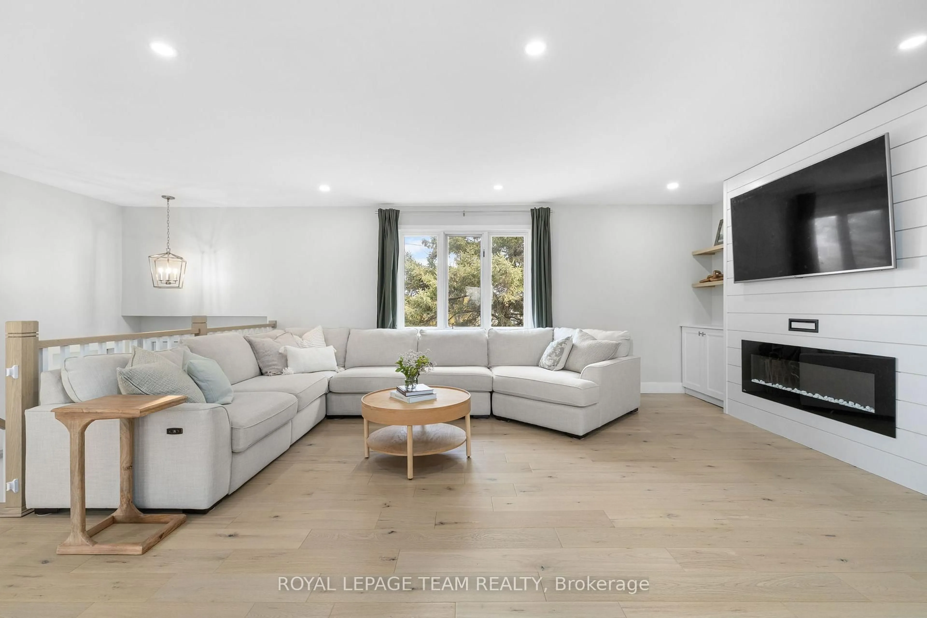 Living room with furniture, unknown for 1386 Johnston Dr, Ottawa Ontario K4P 1A6