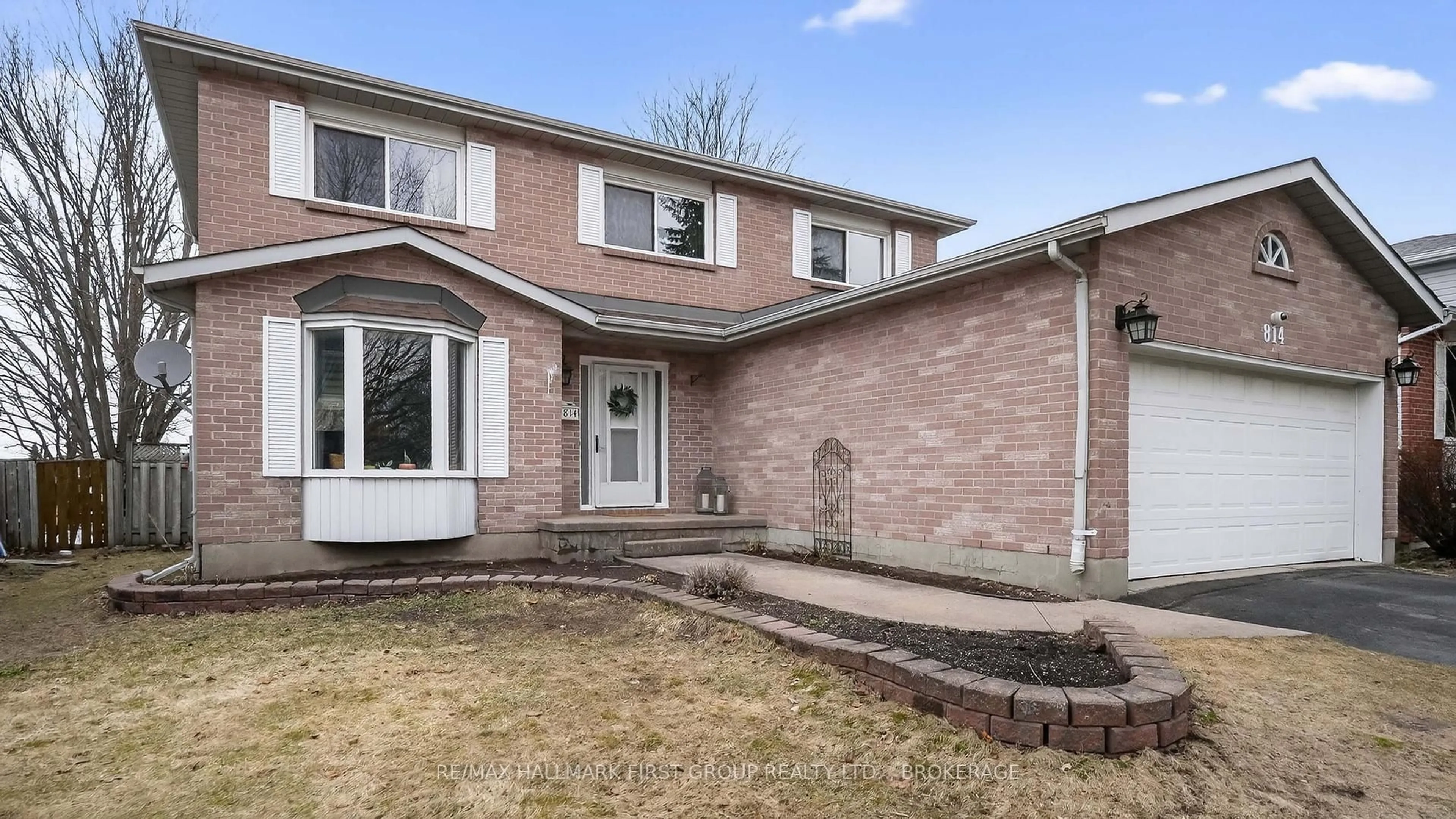 Home with brick exterior material, street for 814 Cataraqui Woods Dr, Kingston Ontario K7P 2P9