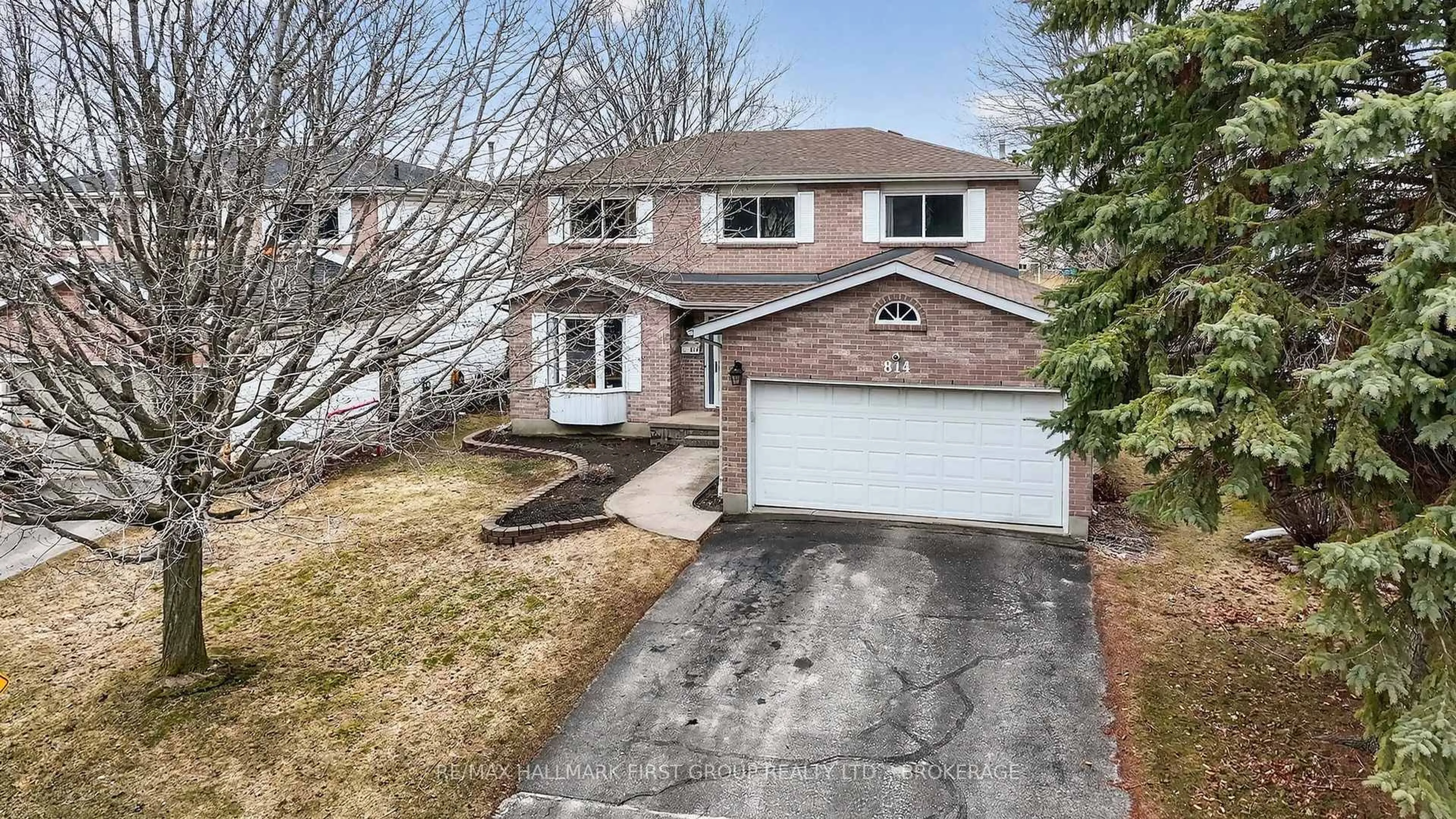 Home with brick exterior material, street for 814 Cataraqui Woods Dr, Kingston Ontario K7P 2P9