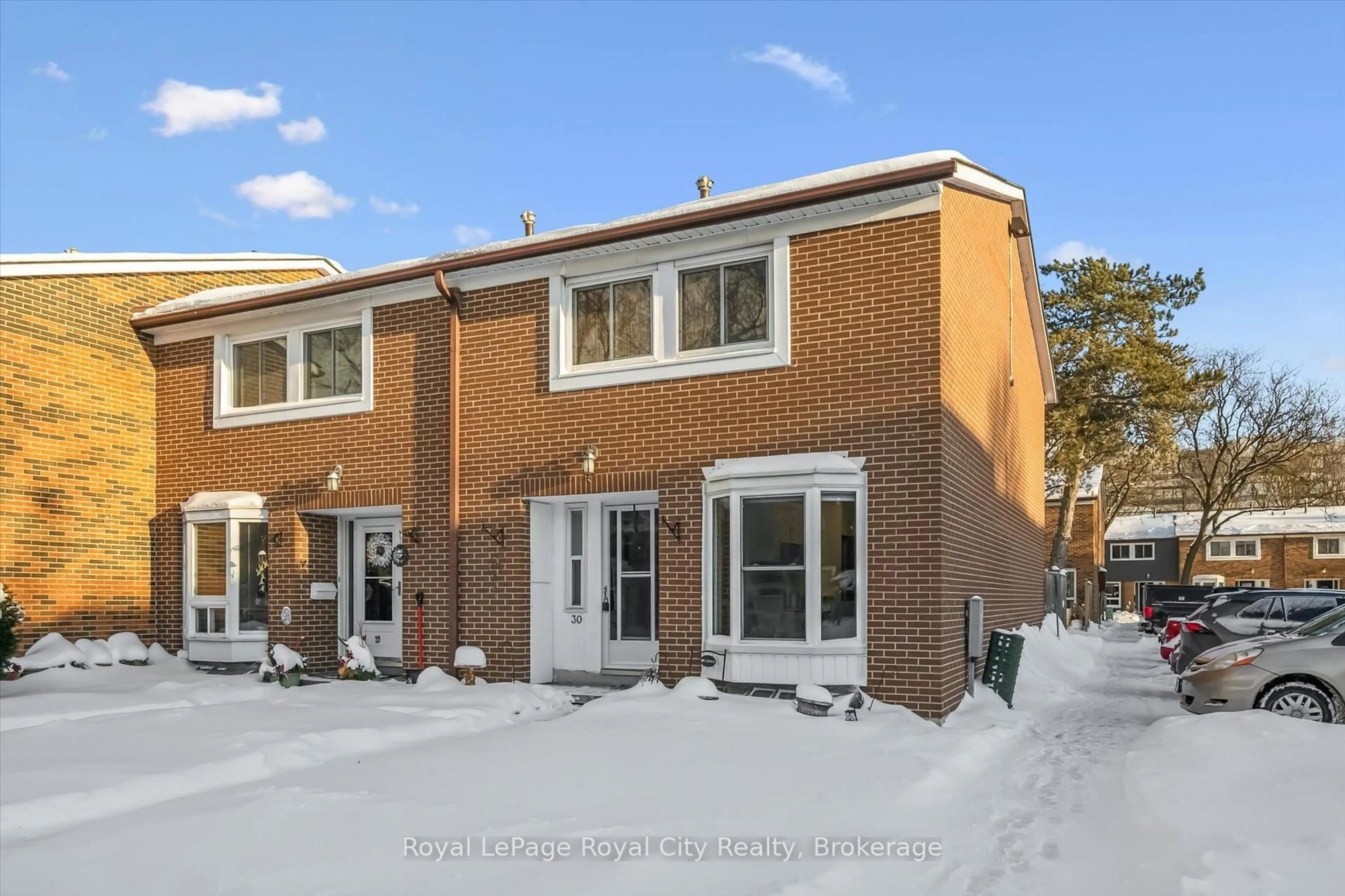 Home with brick exterior material, street for 121 Bagot St #30, Guelph Ontario N1H 5T8