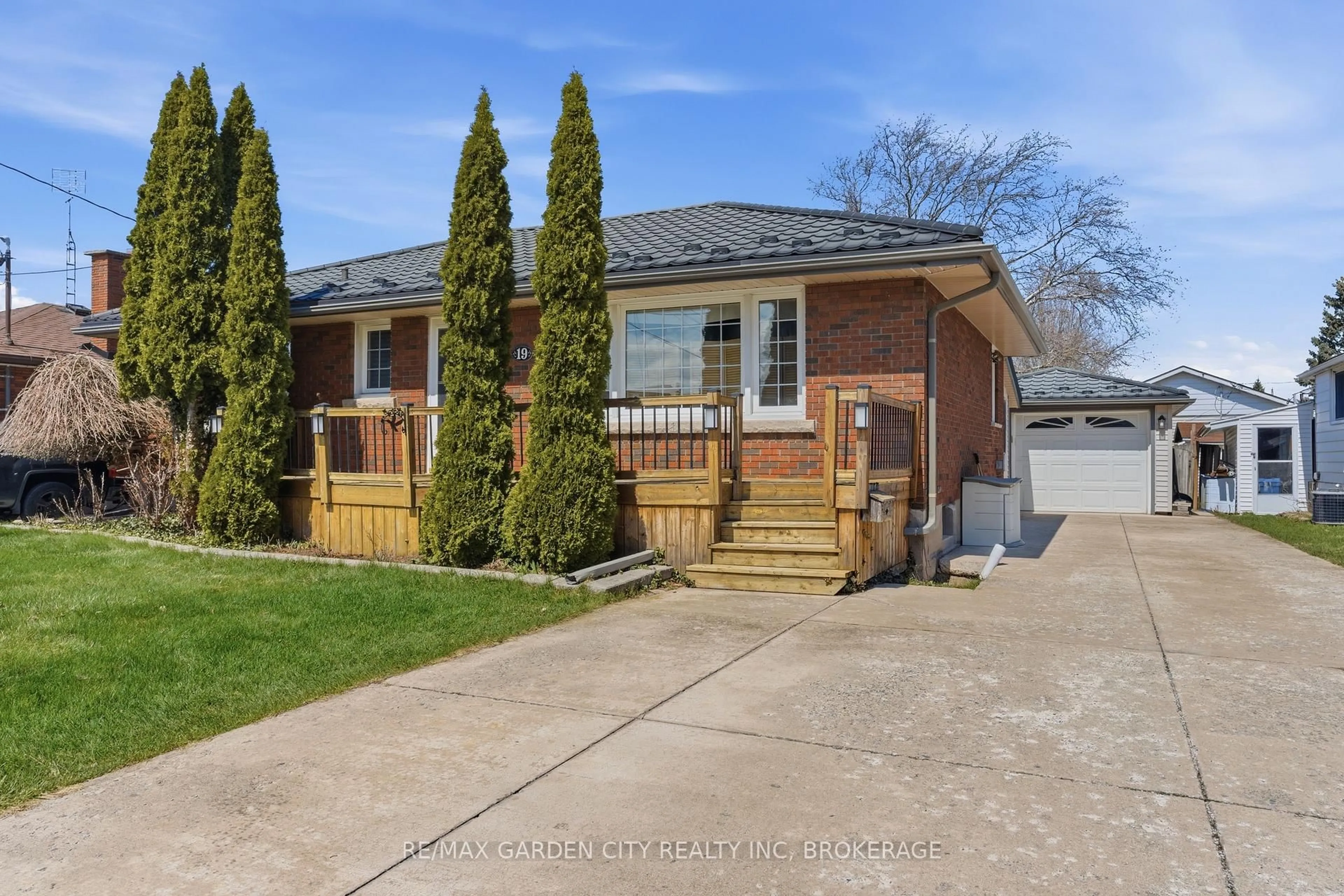 Home with brick exterior material, street for 19 Tamarack Ave, St. Catharines Ontario L2M 3B8