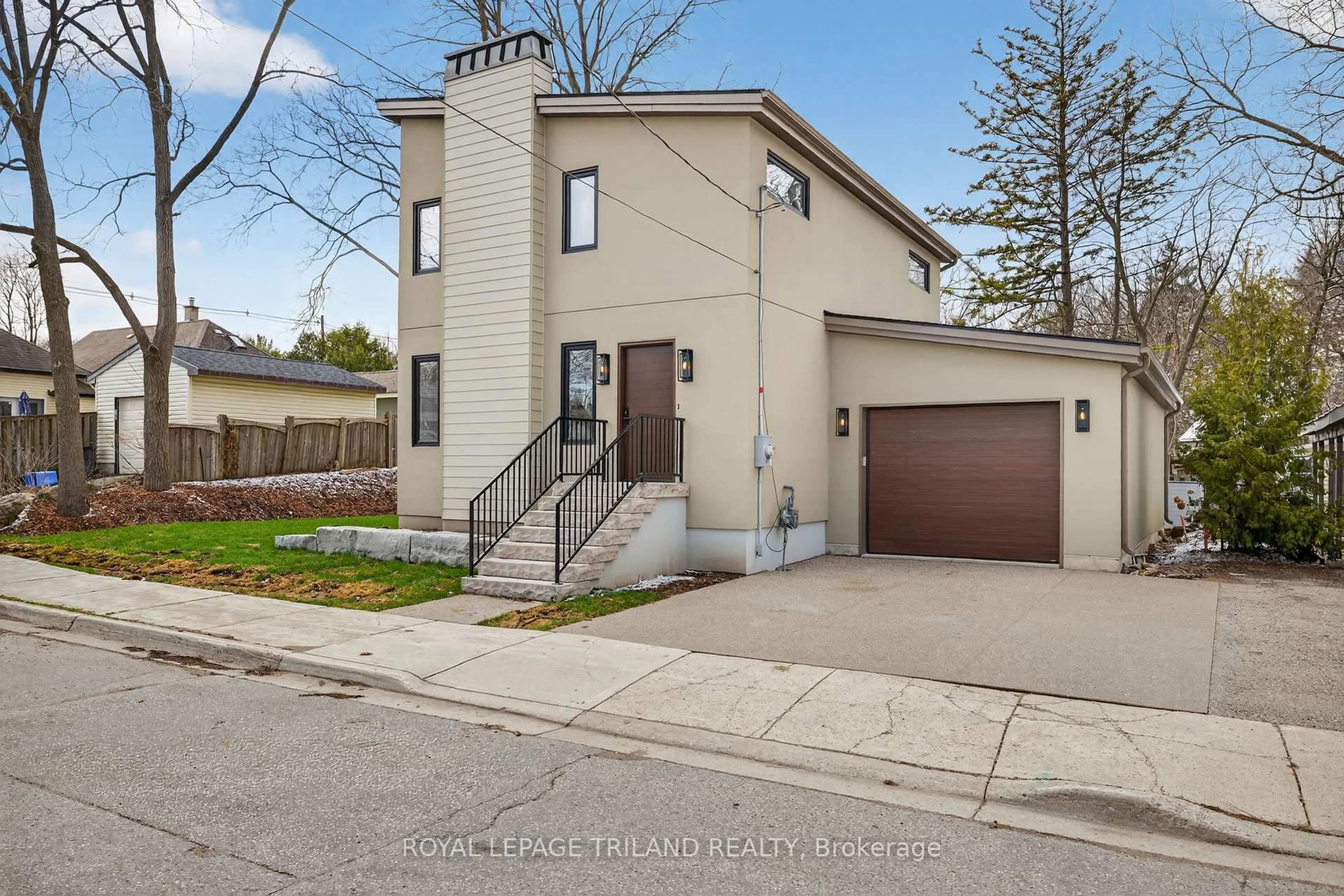 A pic from outside/outdoor area/front of a property/back of a property/a pic from drone, street for 14 Lundy Lane, London South Ontario N6C 3G5