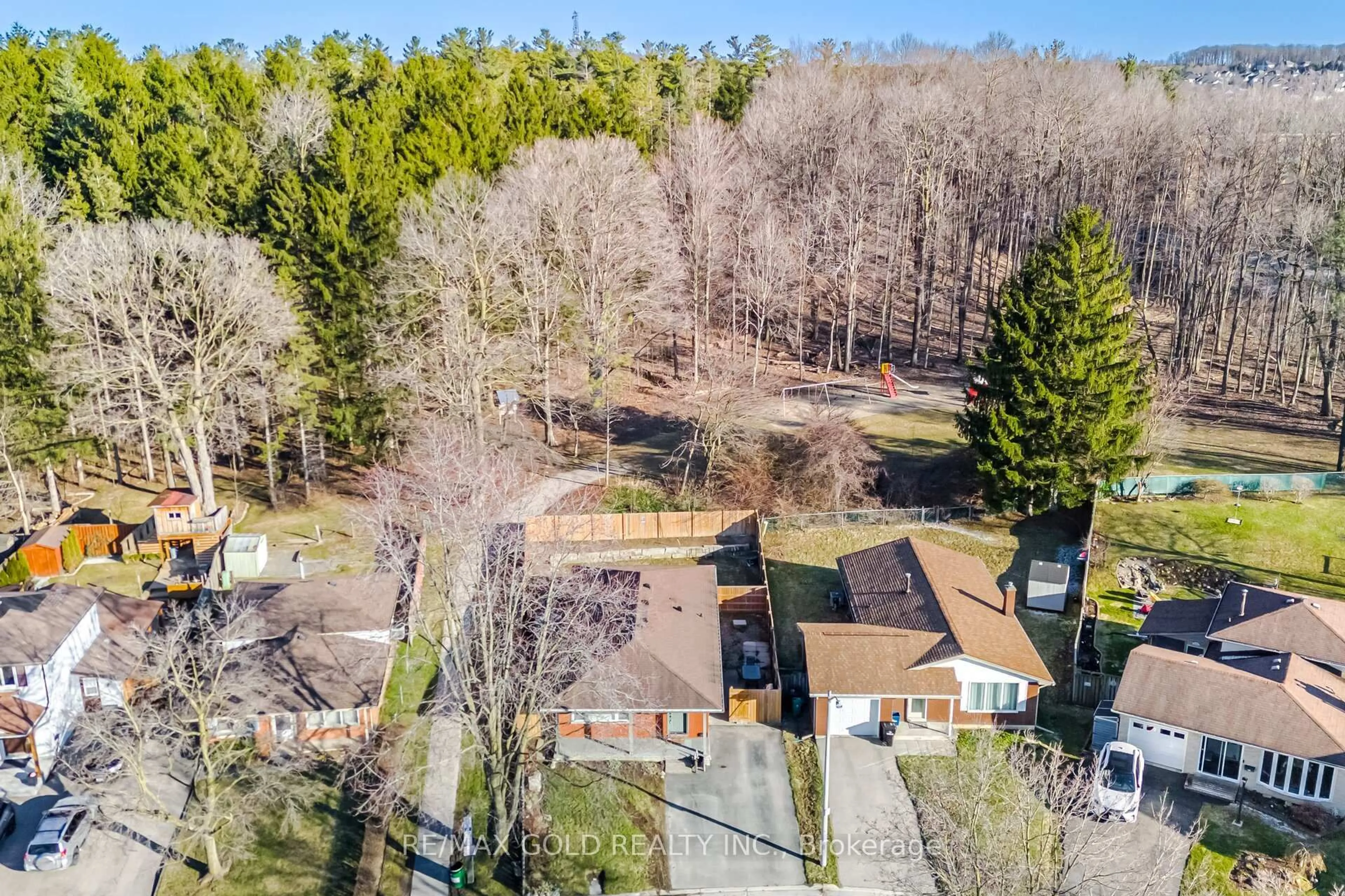A pic from outside/outdoor area/front of a property/back of a property/a pic from drone, forest/trees view for 114 Arrowhead Cres, Kitchener Ontario N2P 1B9