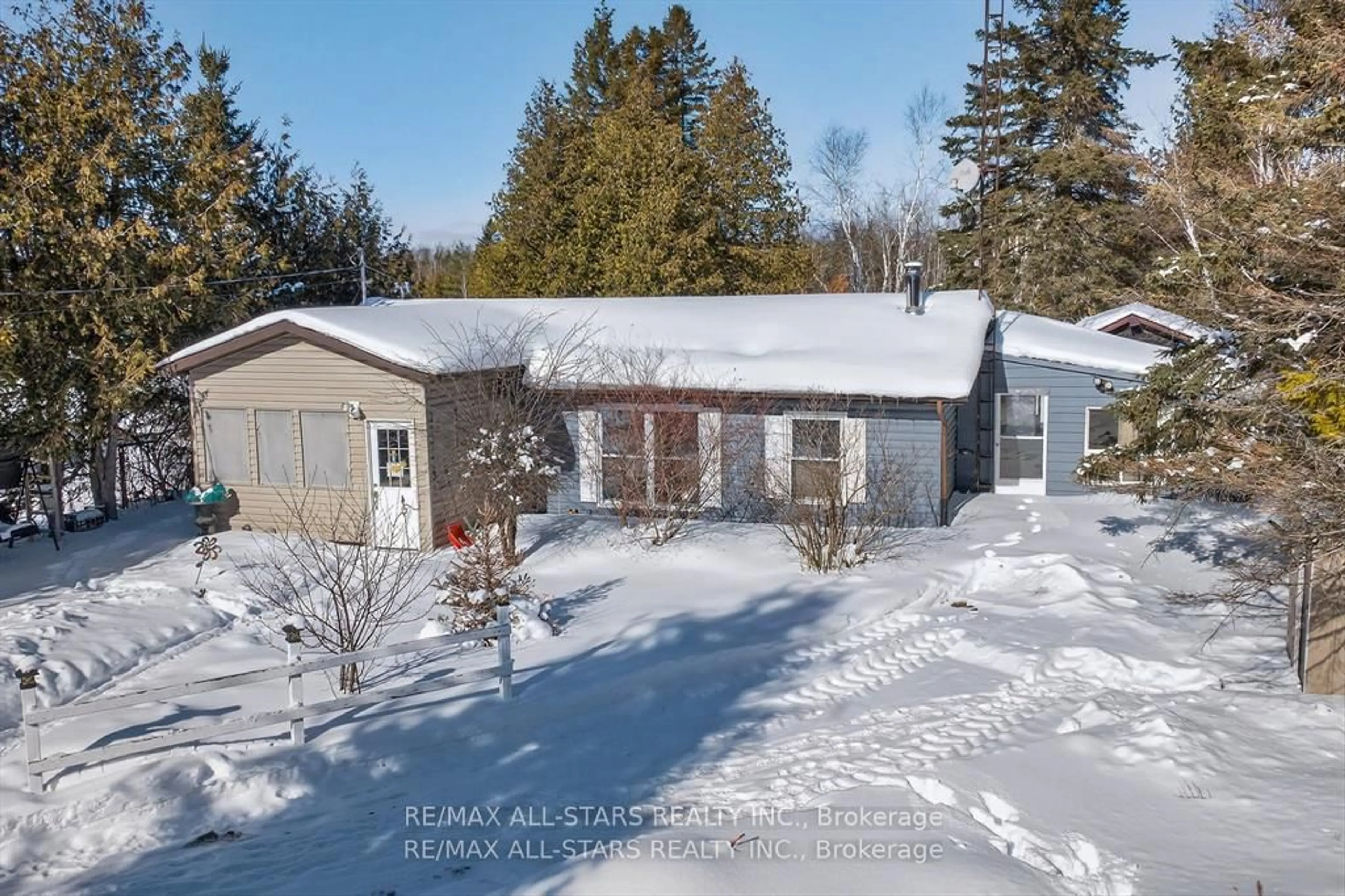 A pic from outside/outdoor area/front of a property/back of a property/a pic from drone, street for 220 McGuire Beach Rd, Kawartha Lakes Ontario K0M 2B0