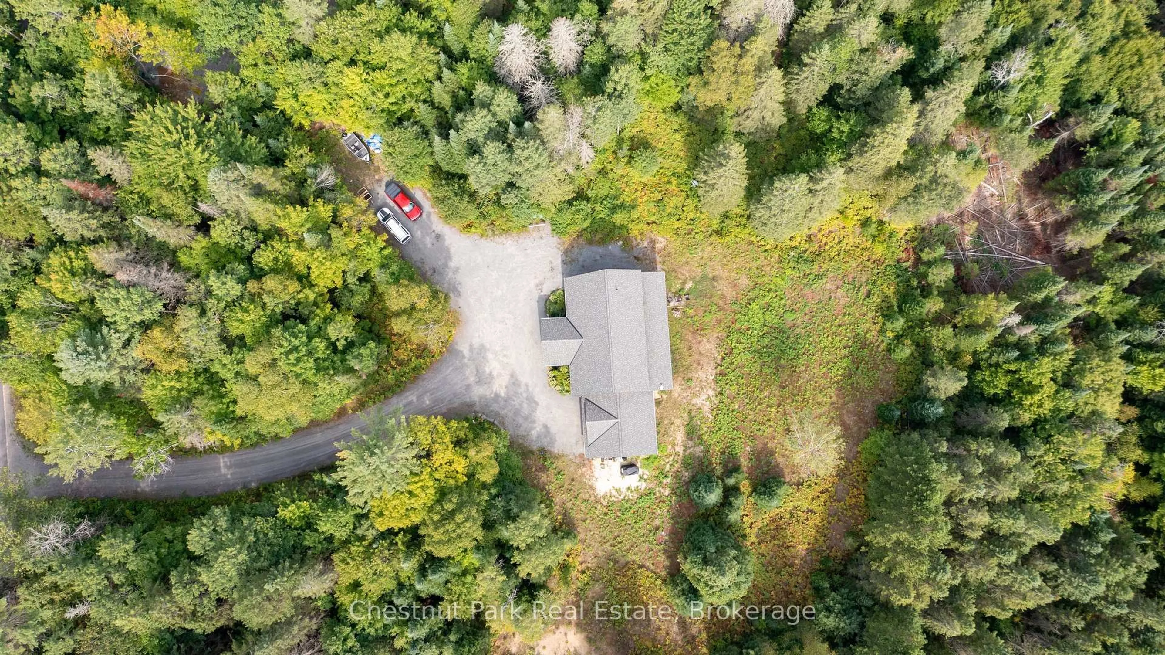 A pic from outside/outdoor area/front of a property/back of a property/a pic from drone, forest/trees view for 1363 Williamsport Rd, Huntsville Ontario P1H 2J4
