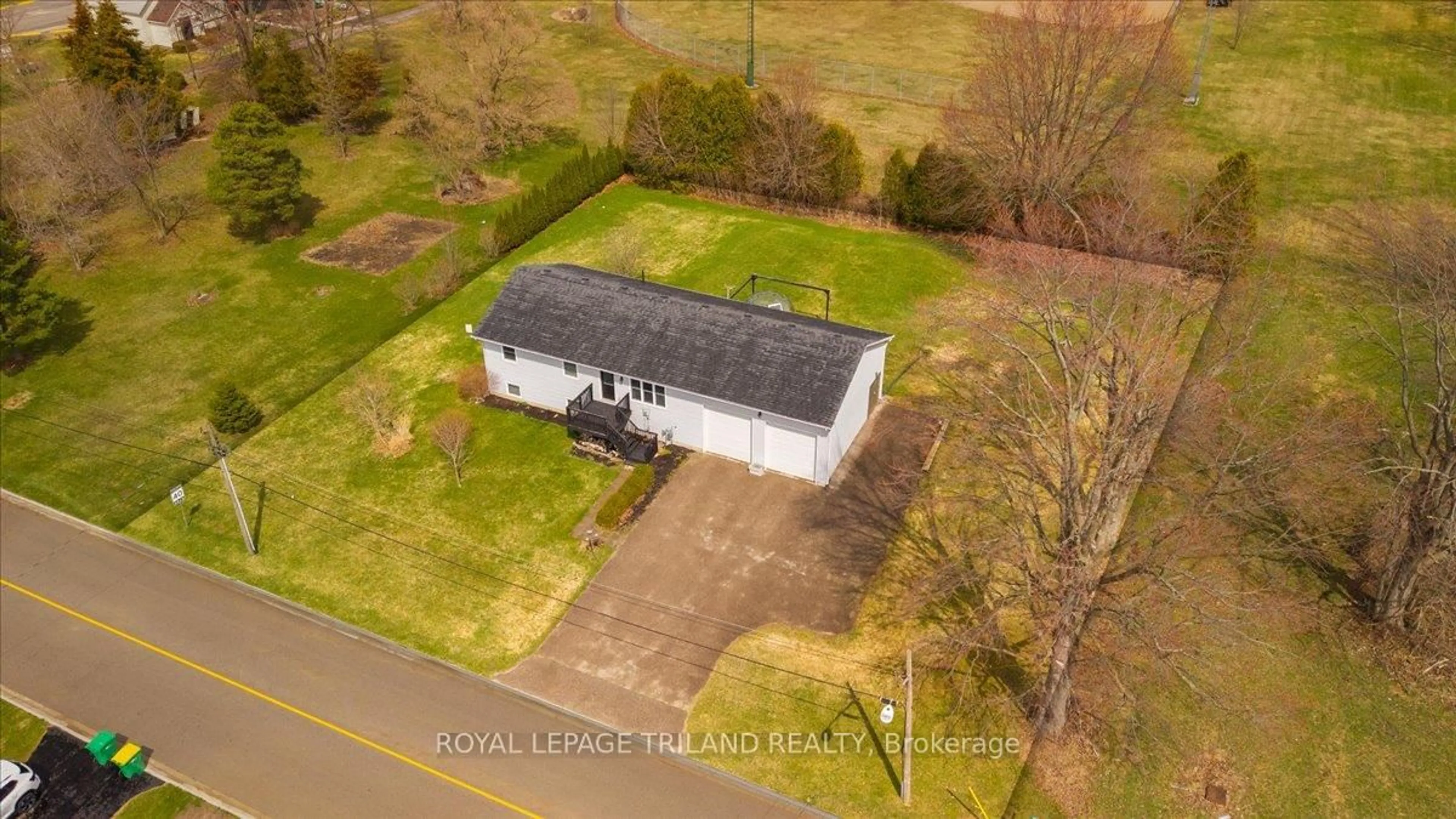 A pic from outside/outdoor area/front of a property/back of a property/a pic from drone, building for 14 Wellington Ave, Southwest Middlesex Ontario N0L 1A0