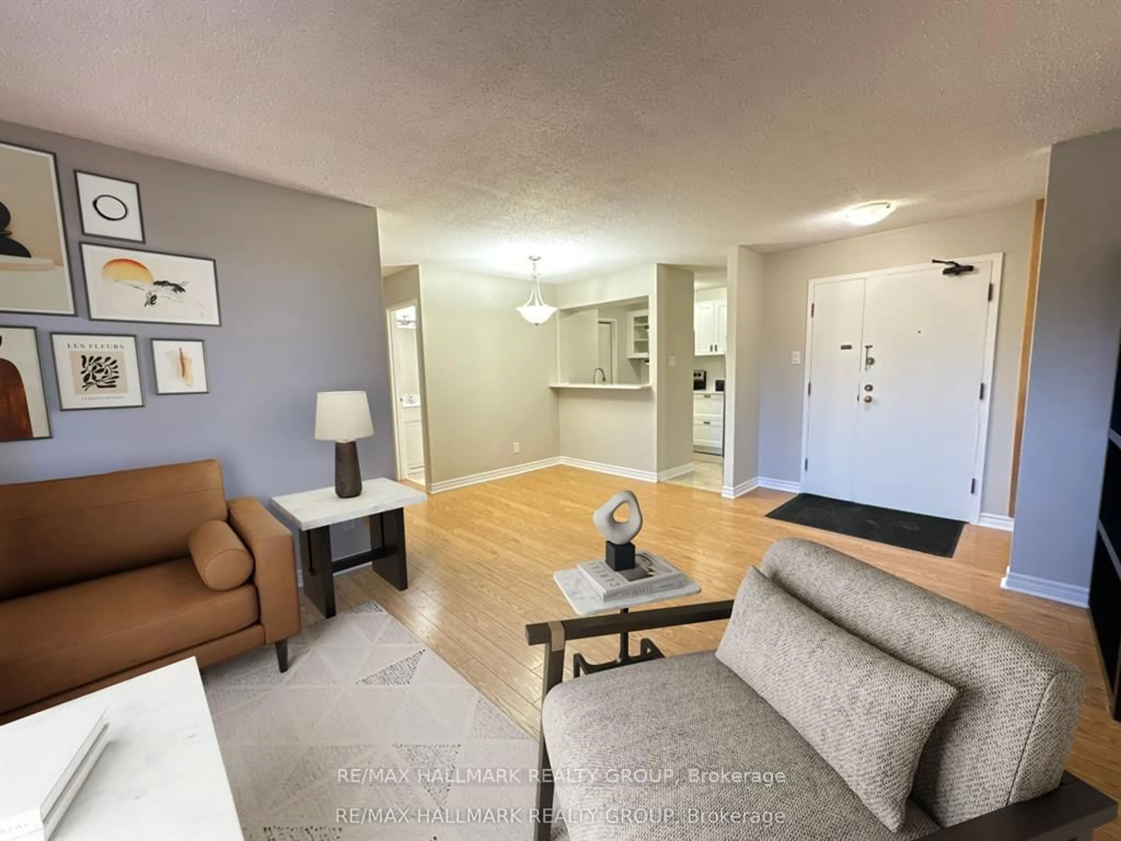 Living room with furniture, unknown for 191 Parkdale Ave #104, Ottawa Ontario K1Y 1E8