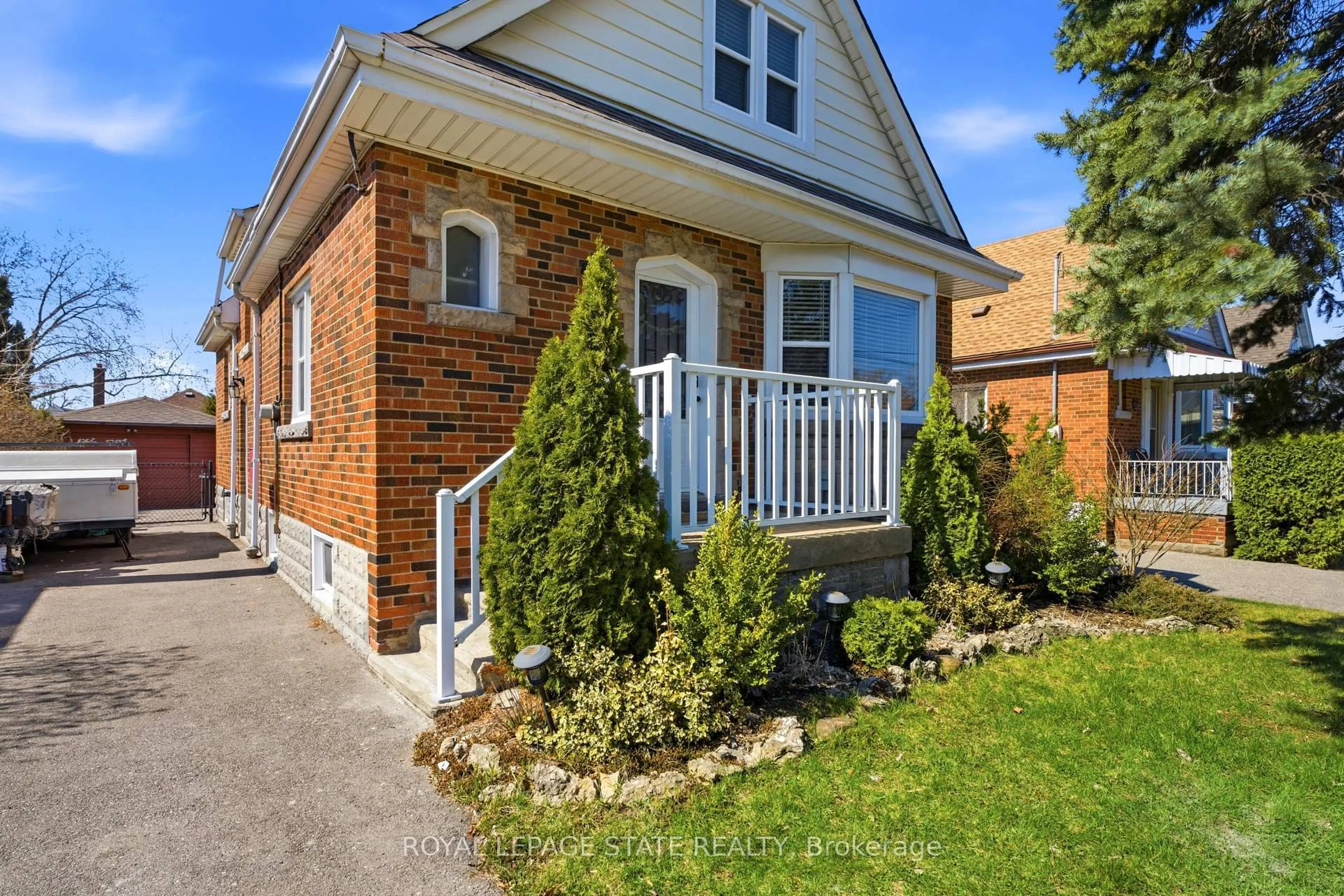 Home with brick exterior material, street for 26 Isabel Ave, Hamilton Ontario L8H 1A9