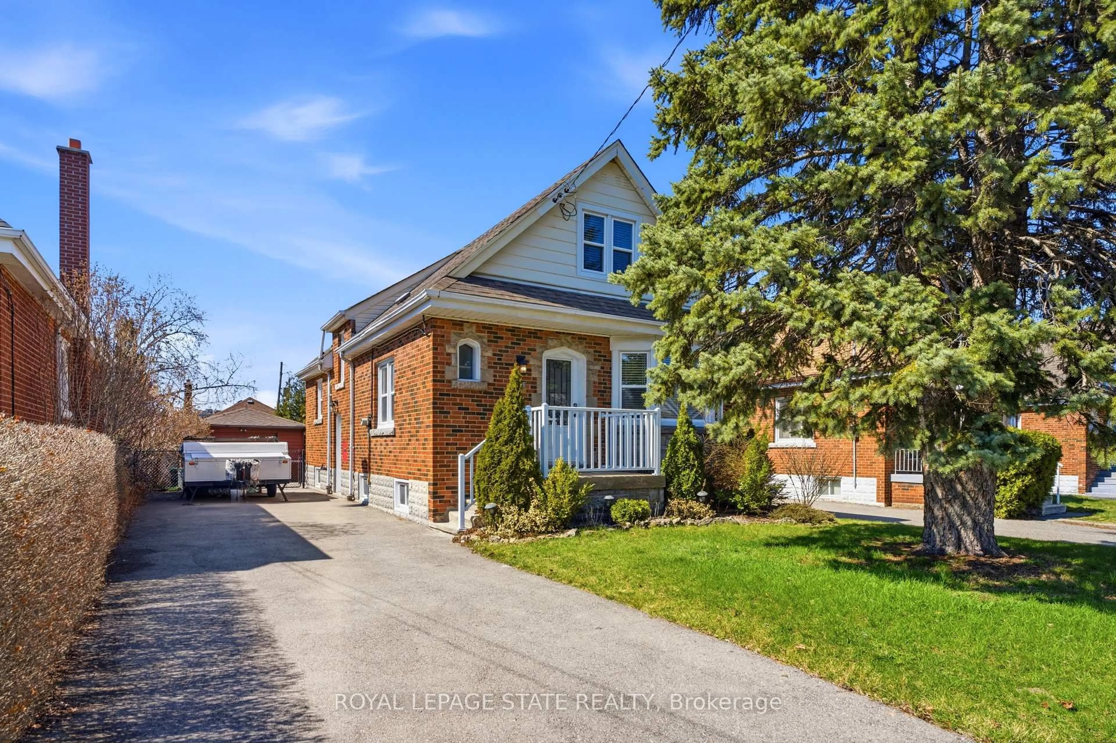 Home with brick exterior material, street for 26 Isabel Ave, Hamilton Ontario L8H 1A9