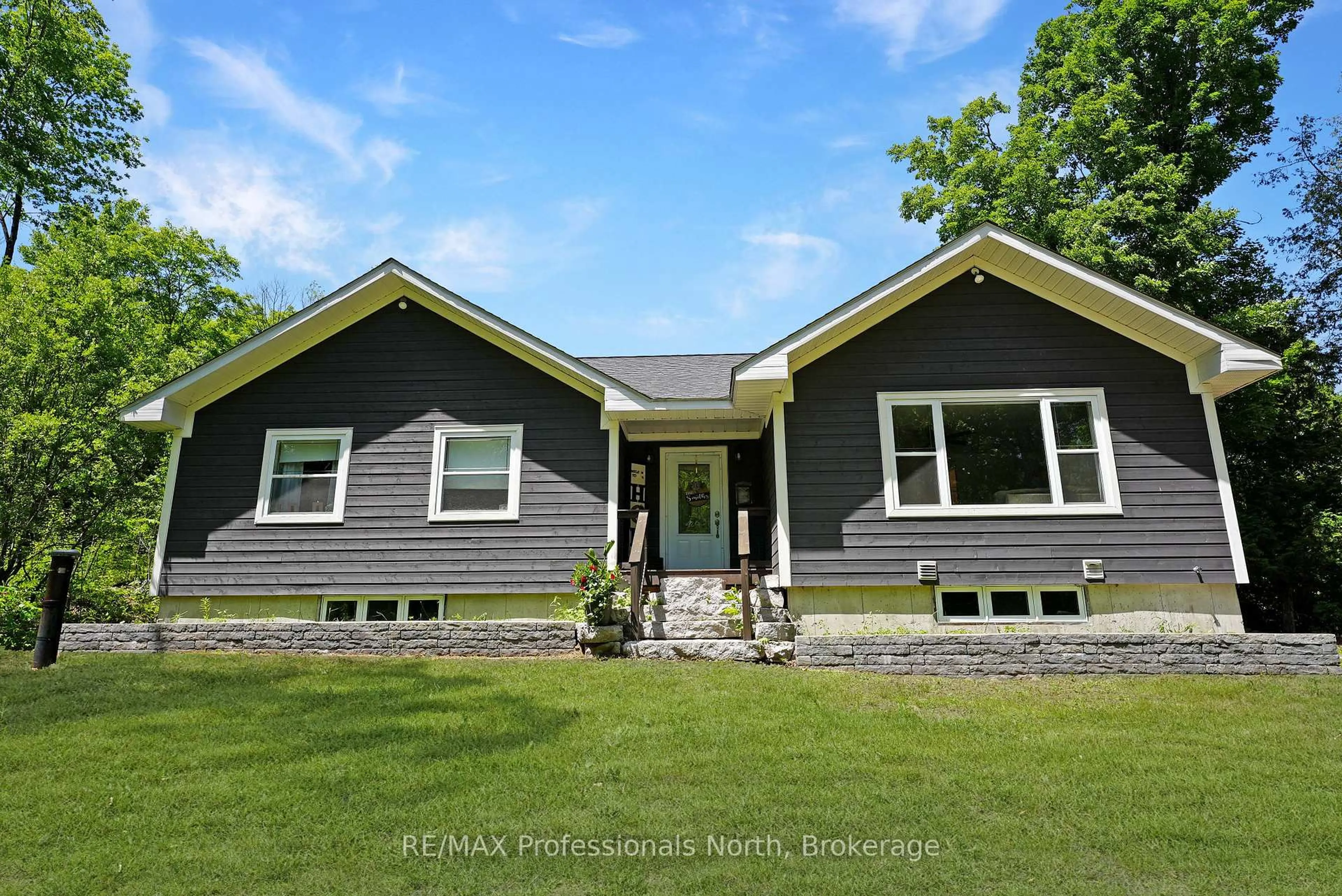 Home with vinyl exterior material, street for 1979 Blairhampton Rd, Minden Hills Ontario K0M 2K0