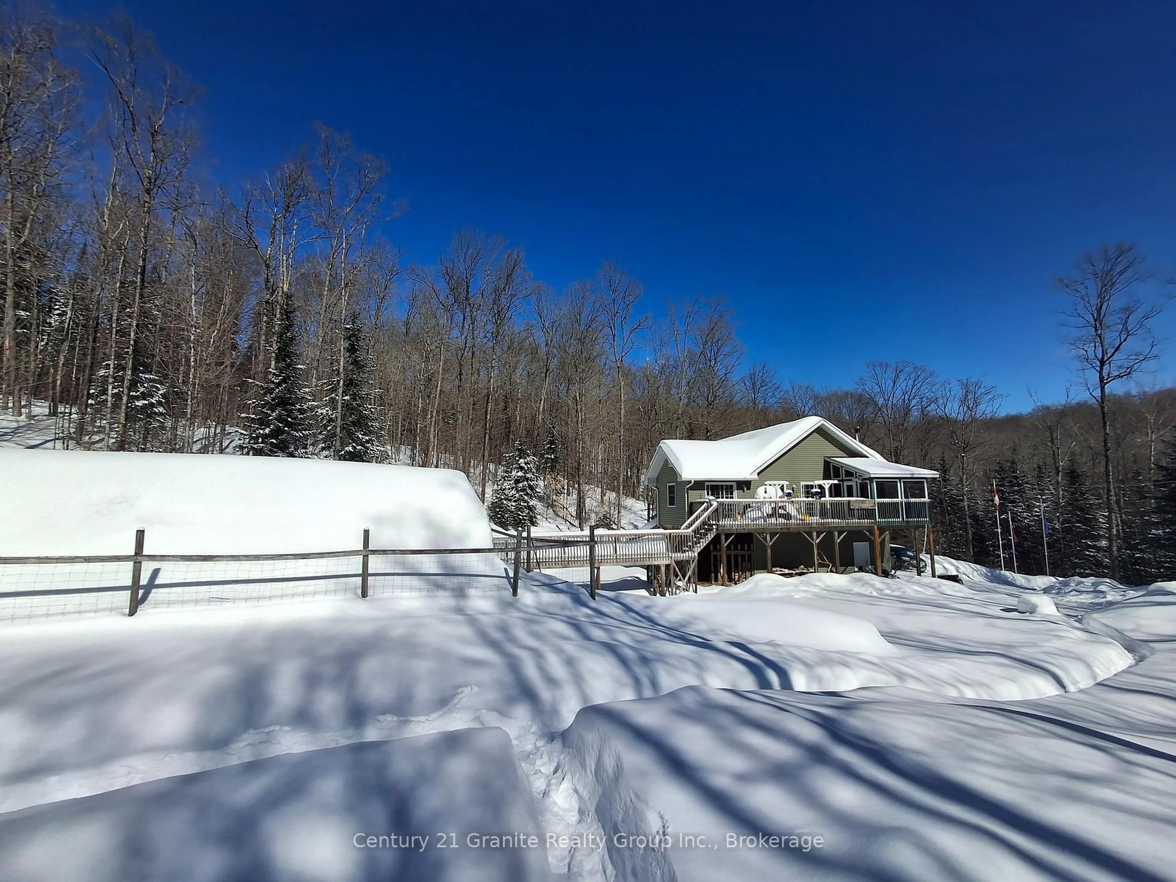 A pic from outside/outdoor area/front of a property/back of a property/a pic from drone, unknown for 1071 Dardanelles Rd, Dysart et al Ontario K0M 1S0