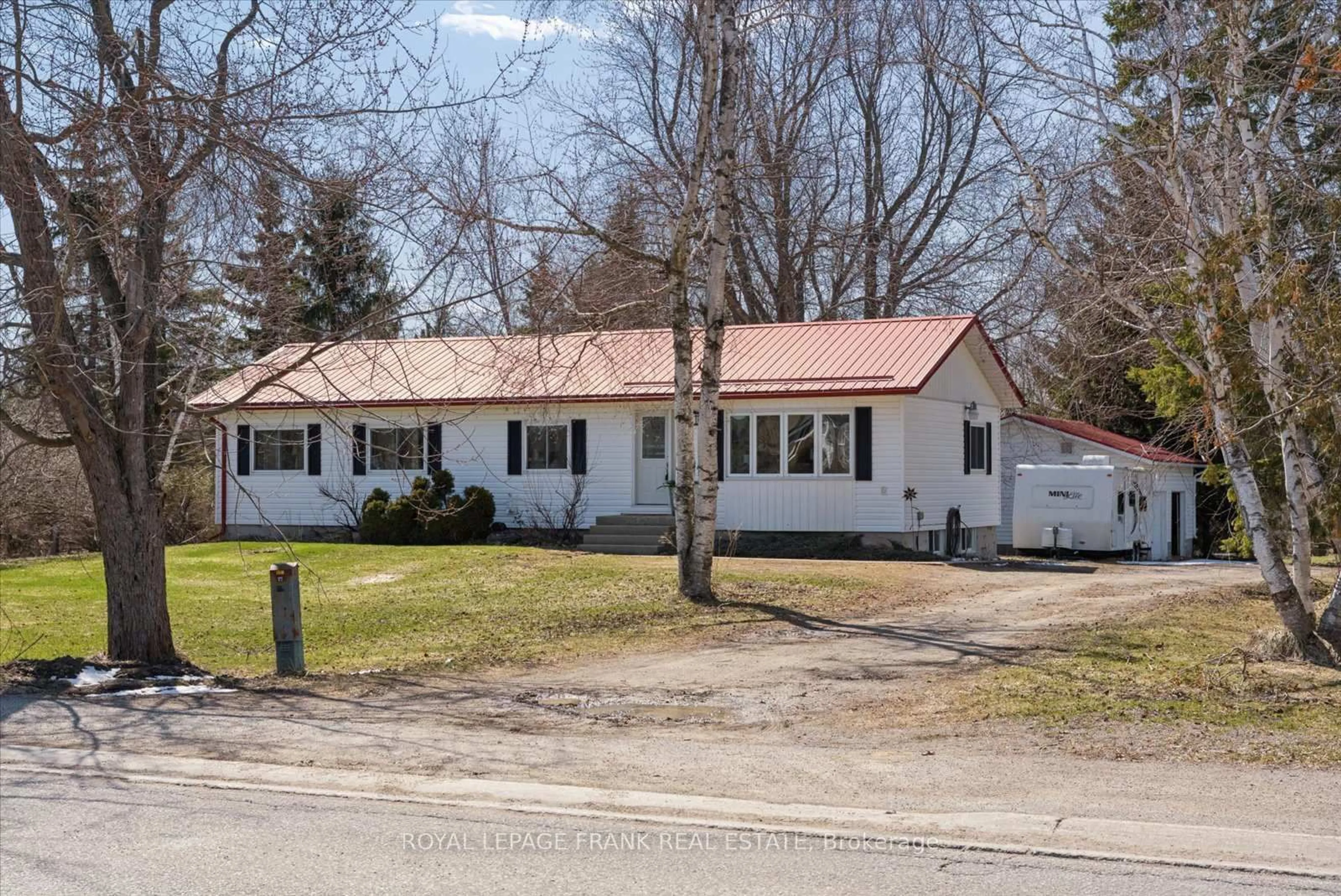 Home with vinyl exterior material, street for 169 Valentia Rd, Kawartha Lakes Ontario L0M 2C0