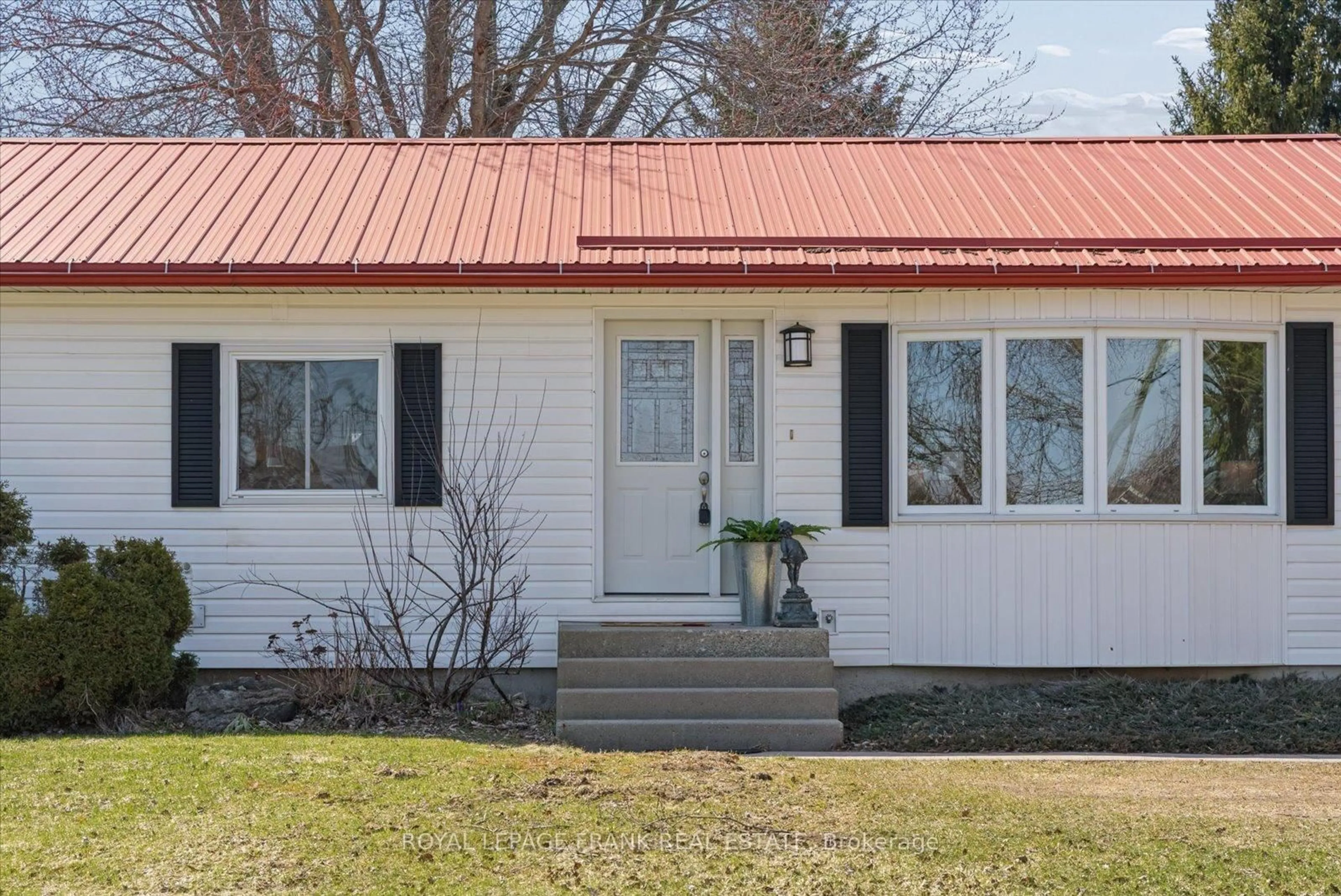 Home with vinyl exterior material, street for 169 Valentia Rd, Kawartha Lakes Ontario L0M 2C0
