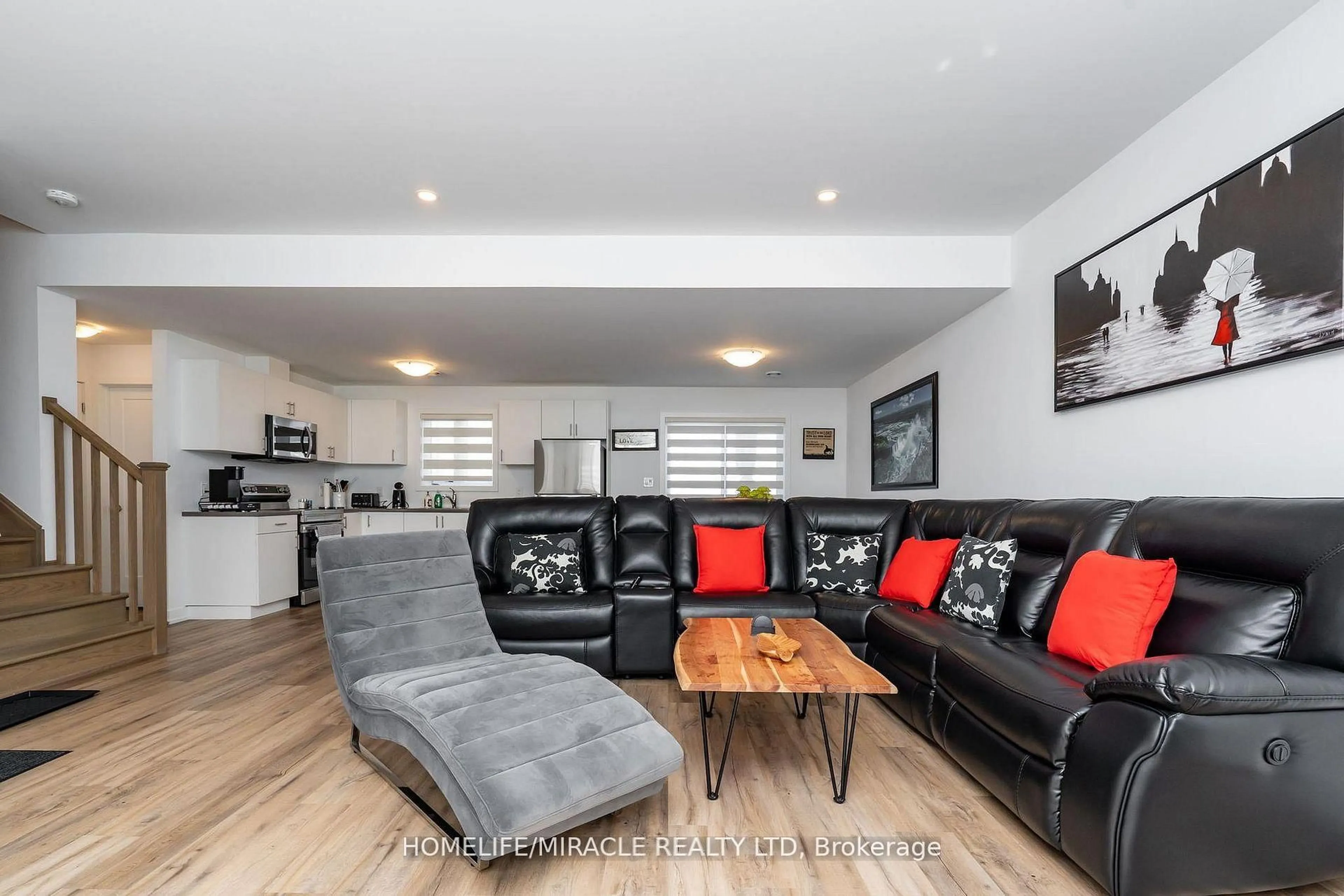 Living room with furniture, unknown for 4263 Fourth Ave #825, Niagara Falls Ontario L2E 0C2