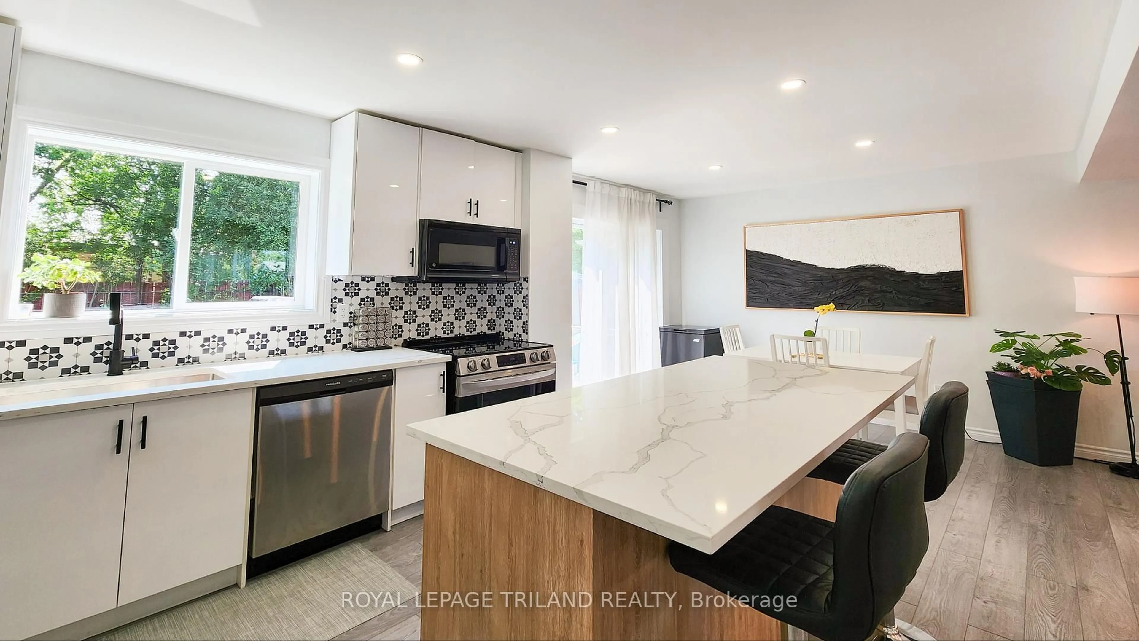 Open concept kitchen, ceramic/tile floor for 51 Ashbury Ave, London South Ontario N6E 1S9